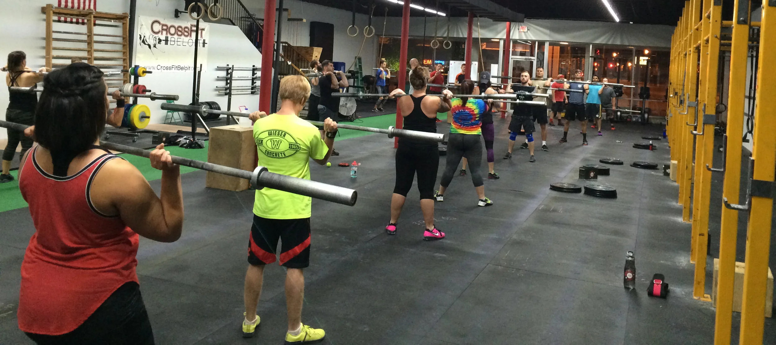 Head Coach and Owner Scott instructing a group CrossFit class