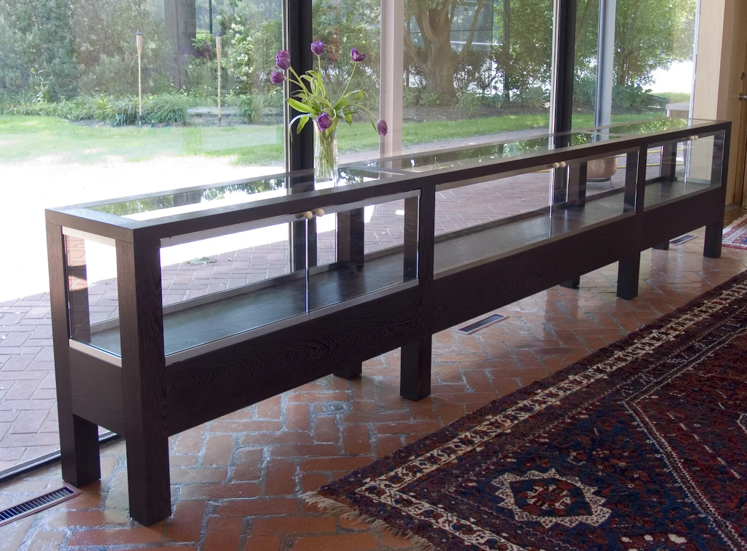 Custom 15' Wengé, Glass And Stainless Sideboard
