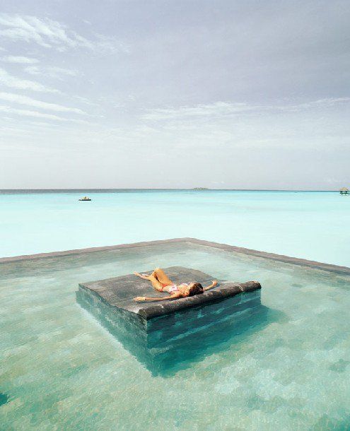 Relax under the sun, or ooh under the stars! Unknown source VIA mediacache