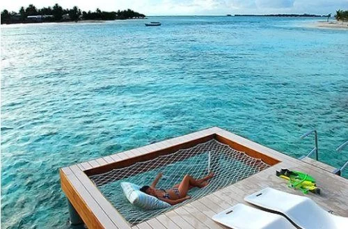 Inset hammock with a ladder Source: Thechive