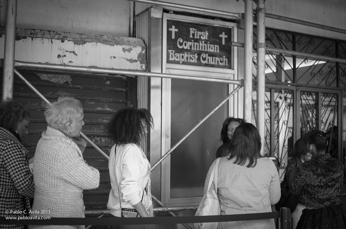 Church-goers waiting in line to get inside.