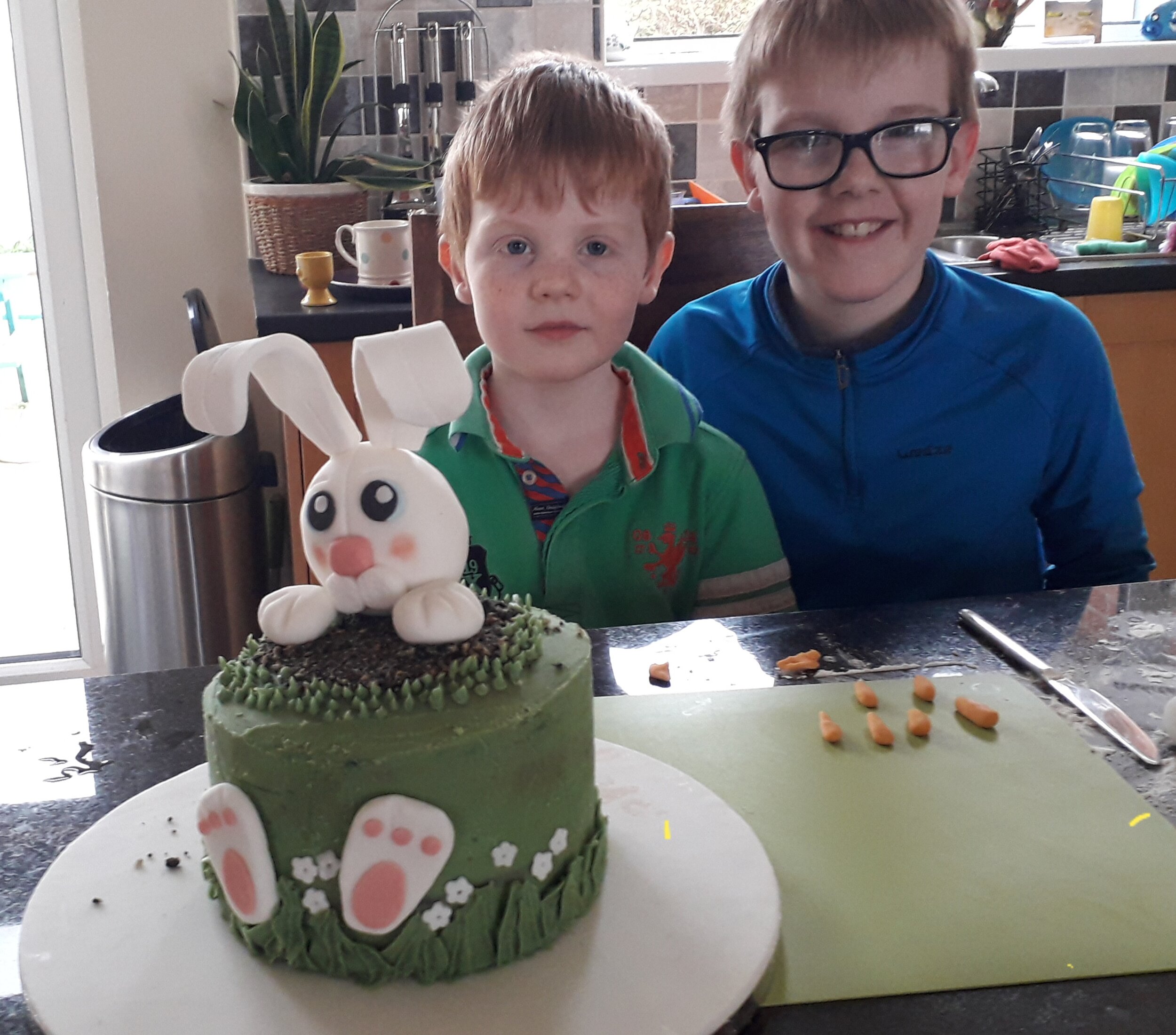 Dan &amp; Harry helping to make fondant carrots for the Easter bunny cake!