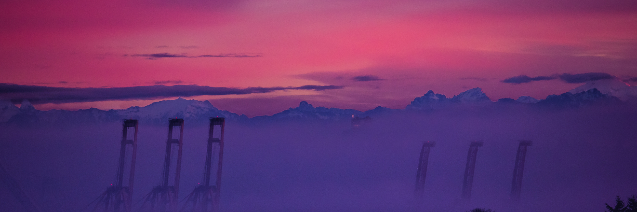 Seattle Cranes and the Cascade Mountains at Sunrise