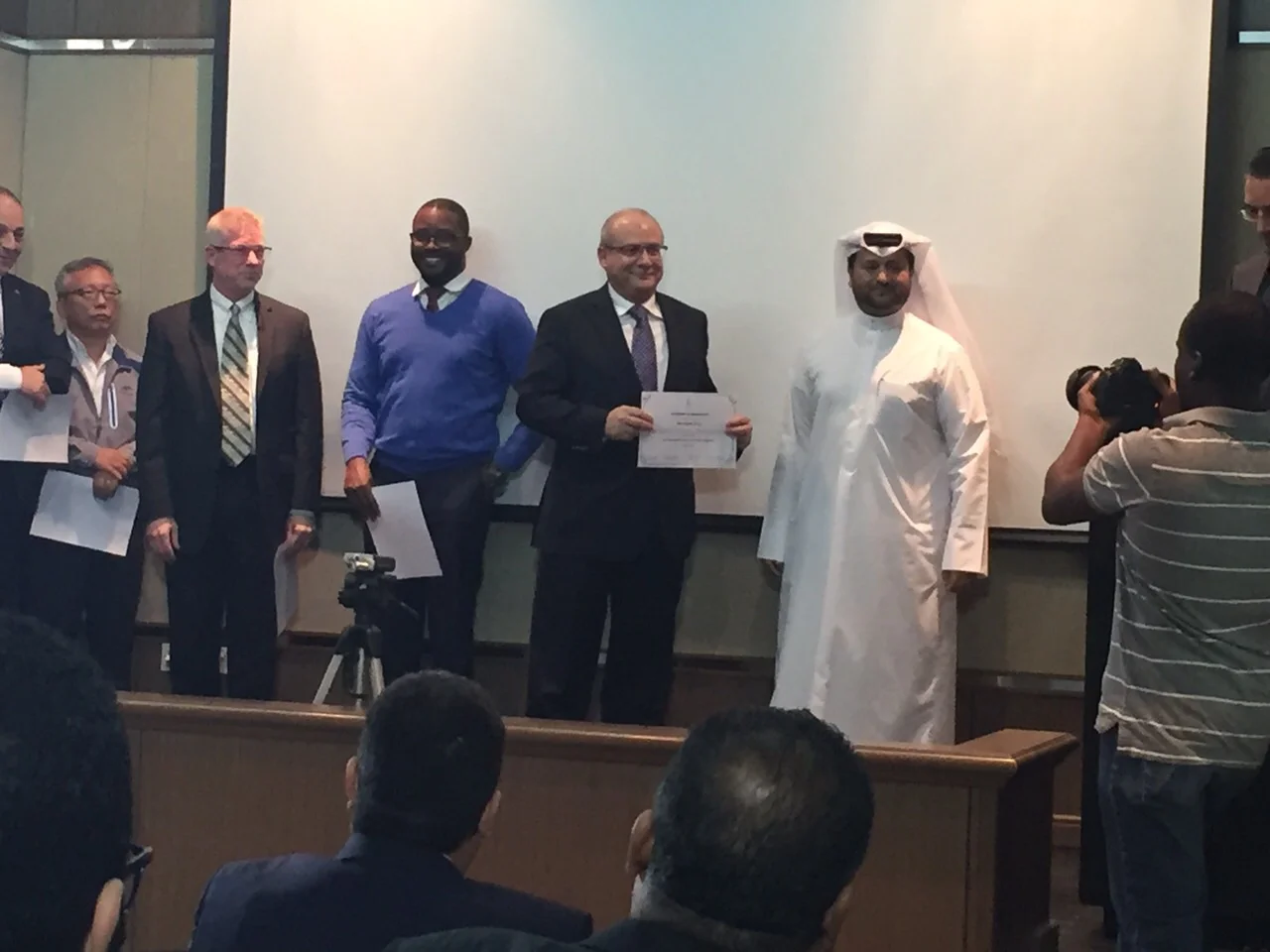 Mr. Nidal Salameh accepting Letter of Appreciation