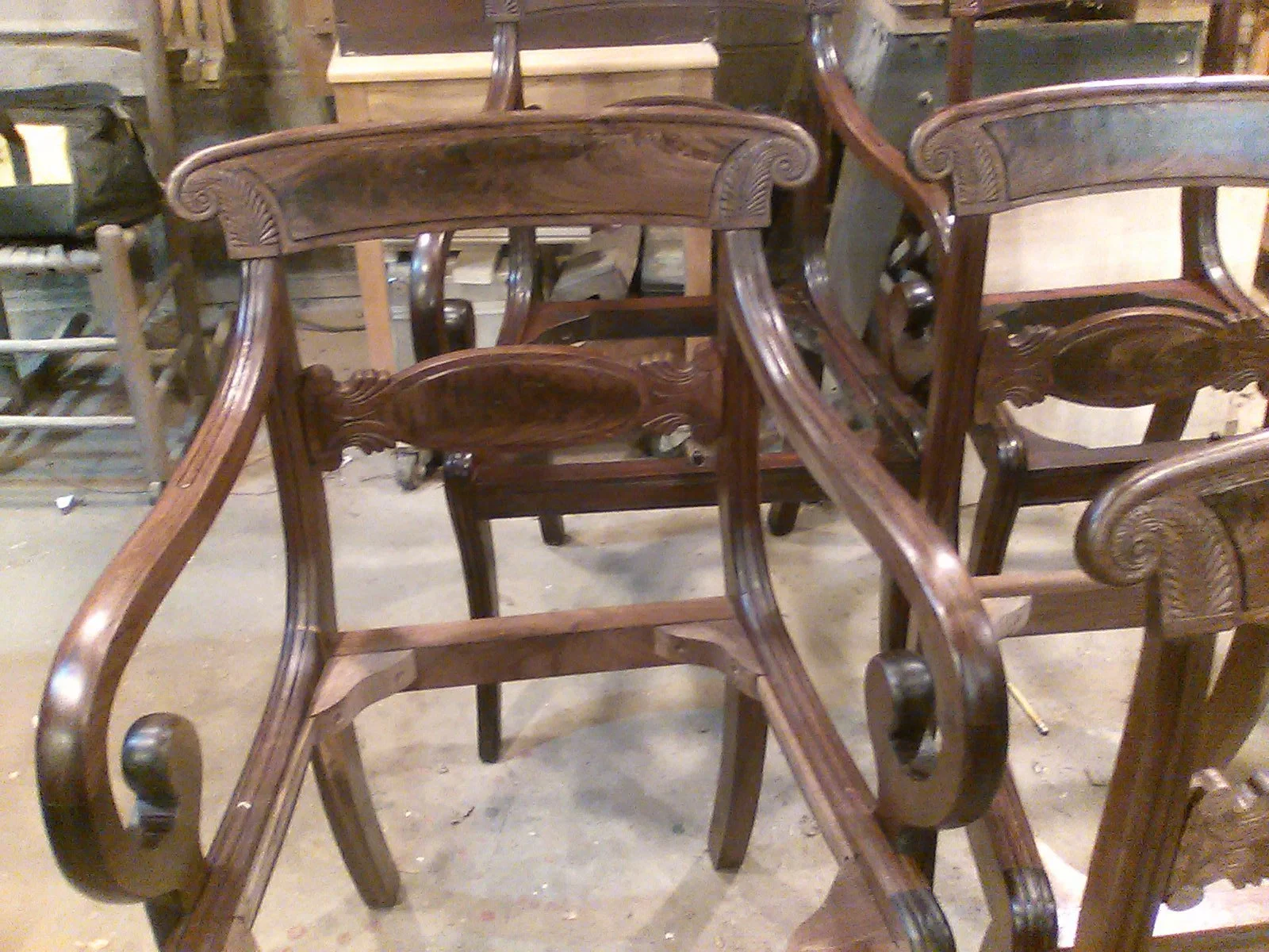 Custom reproduction Federal dining chairs built to match and fill out an existing set of antiques.