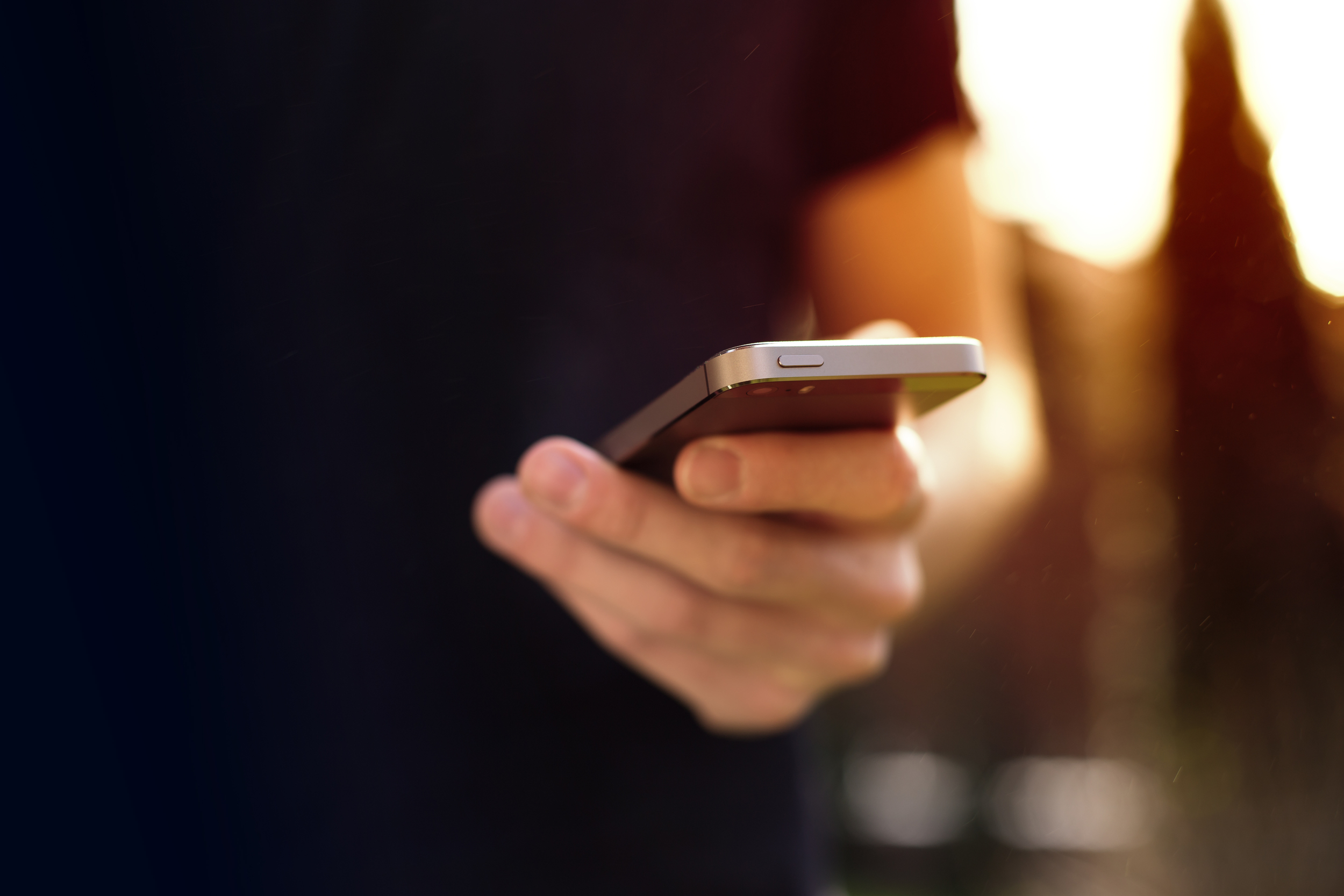 shutterstock_269190068 person using iphone.jpg