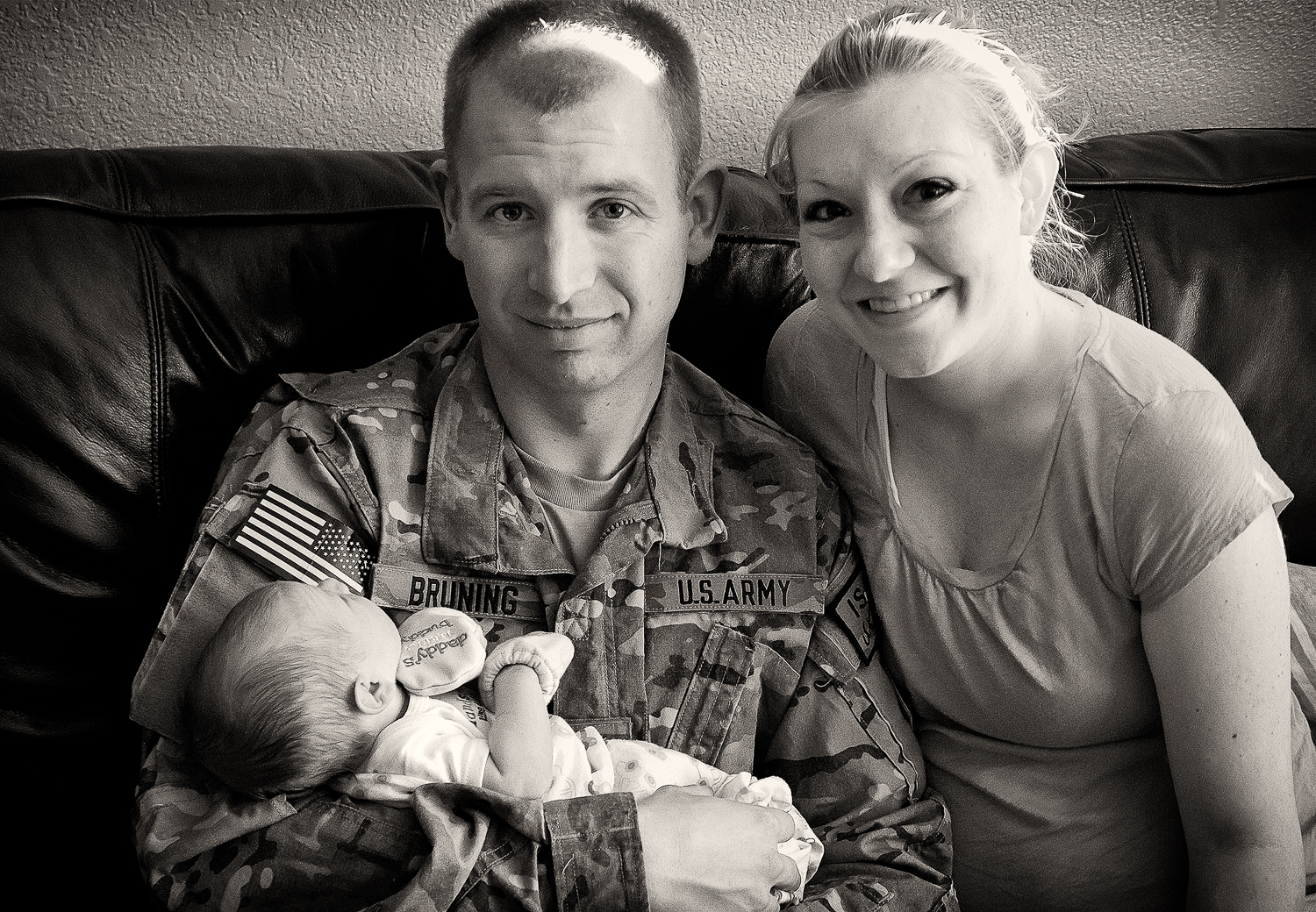 Hayden with Mom and Dad.jpg