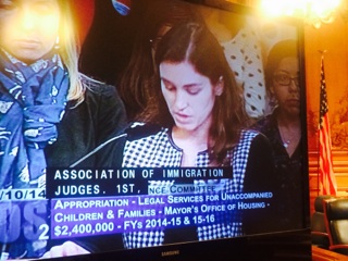  Bianca Santos, Director of International Human Rights Program and Immigration Attorney,&nbsp;testifies in support&nbsp;of access to counsel initiative (City Hall, Sept. 2014) 