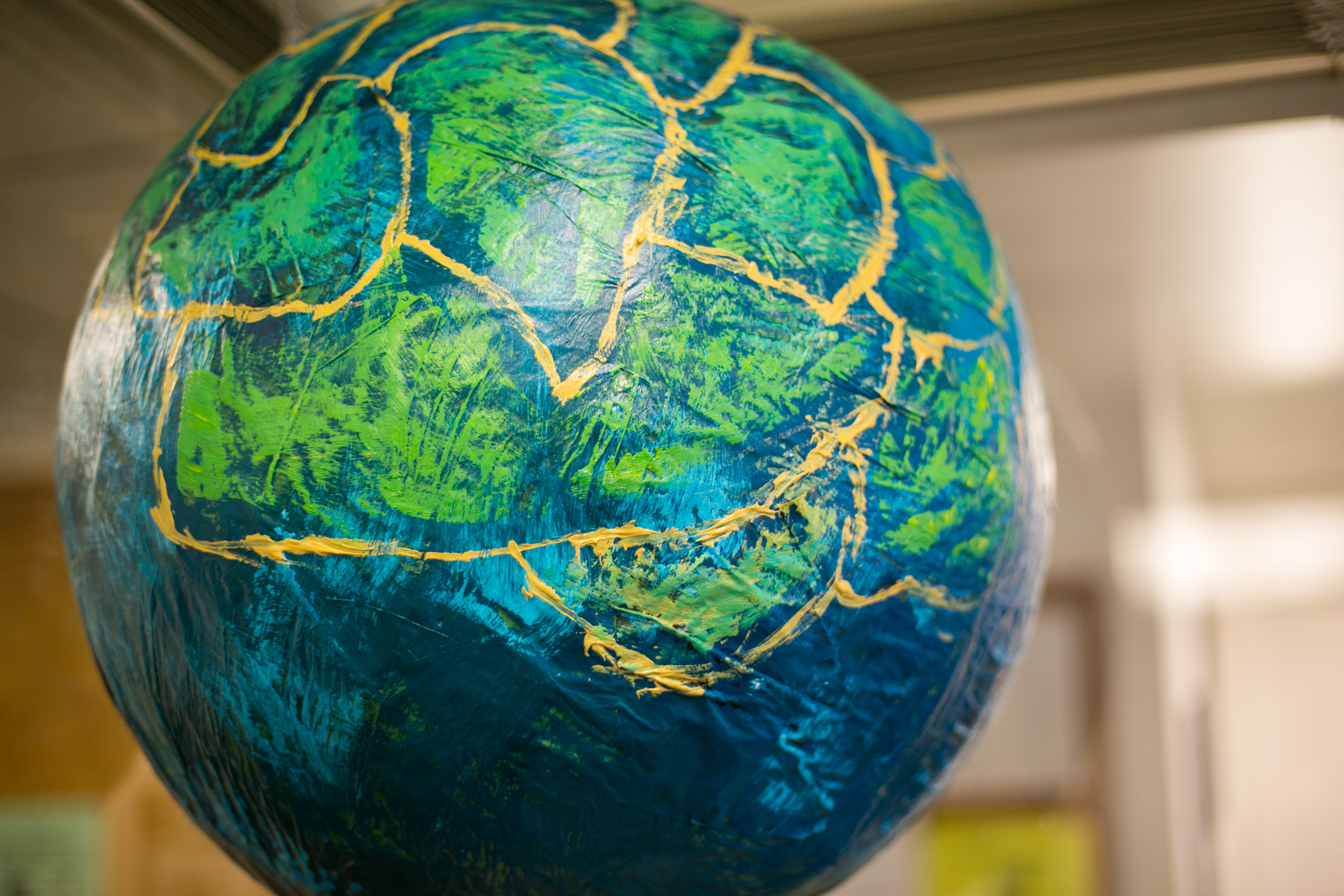 "Pangea" was the name of the earth's original continent when it was one connected landmass. For us, "Pangea" symbolizes the unity and oneness of our global community. The pinata-globe depicted above was a gift by one of our board me…