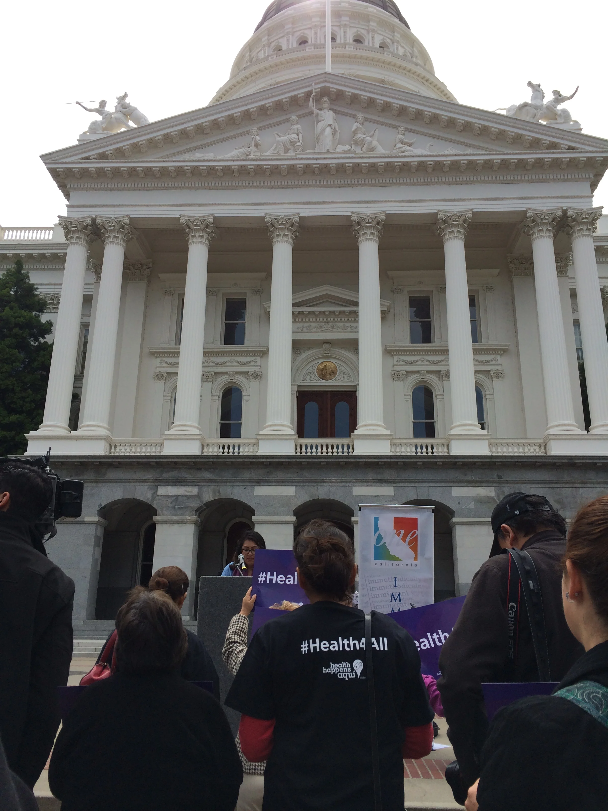 Pangea staff and volunteers with partners at Immigrant Day in Sacramento, CA (2015)