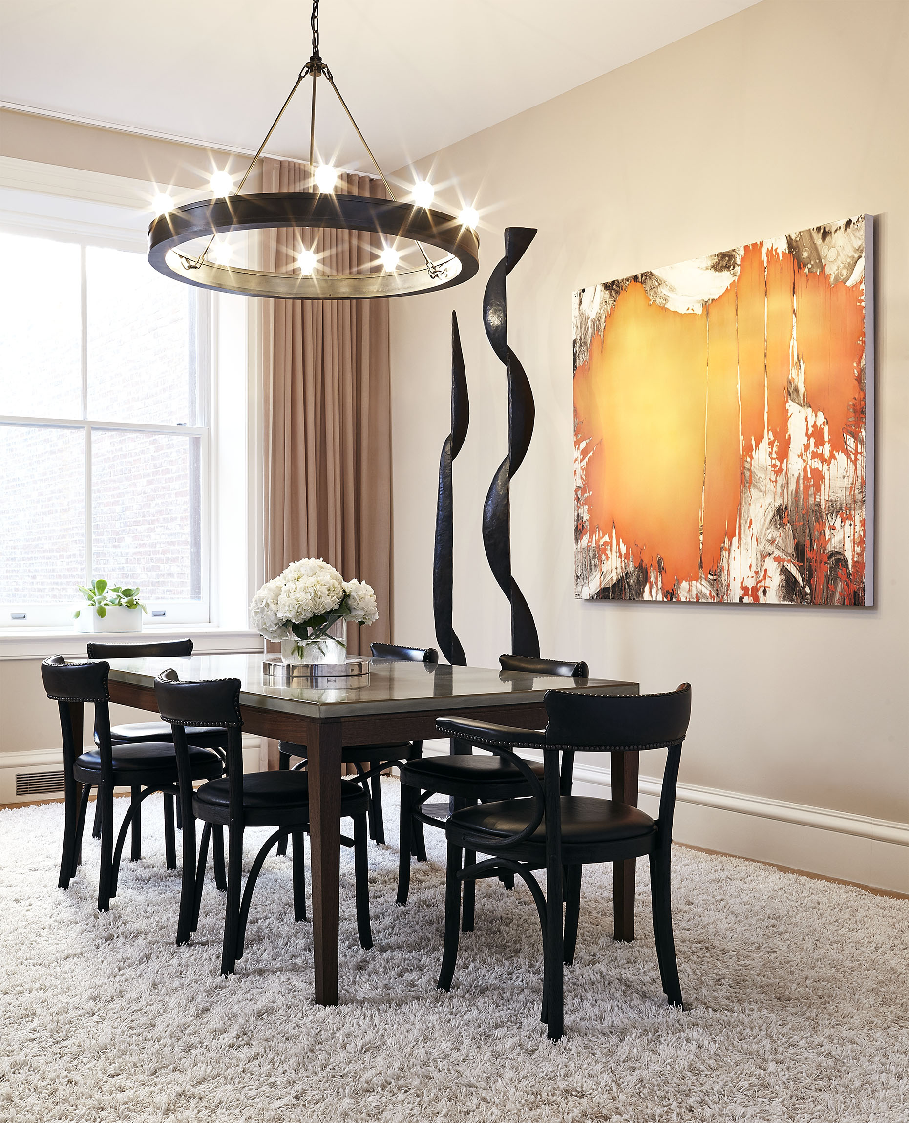 Painting by Jeff Muhs represented by Lyons Weir Gallery, bronze sculptures by Tom Corbin .