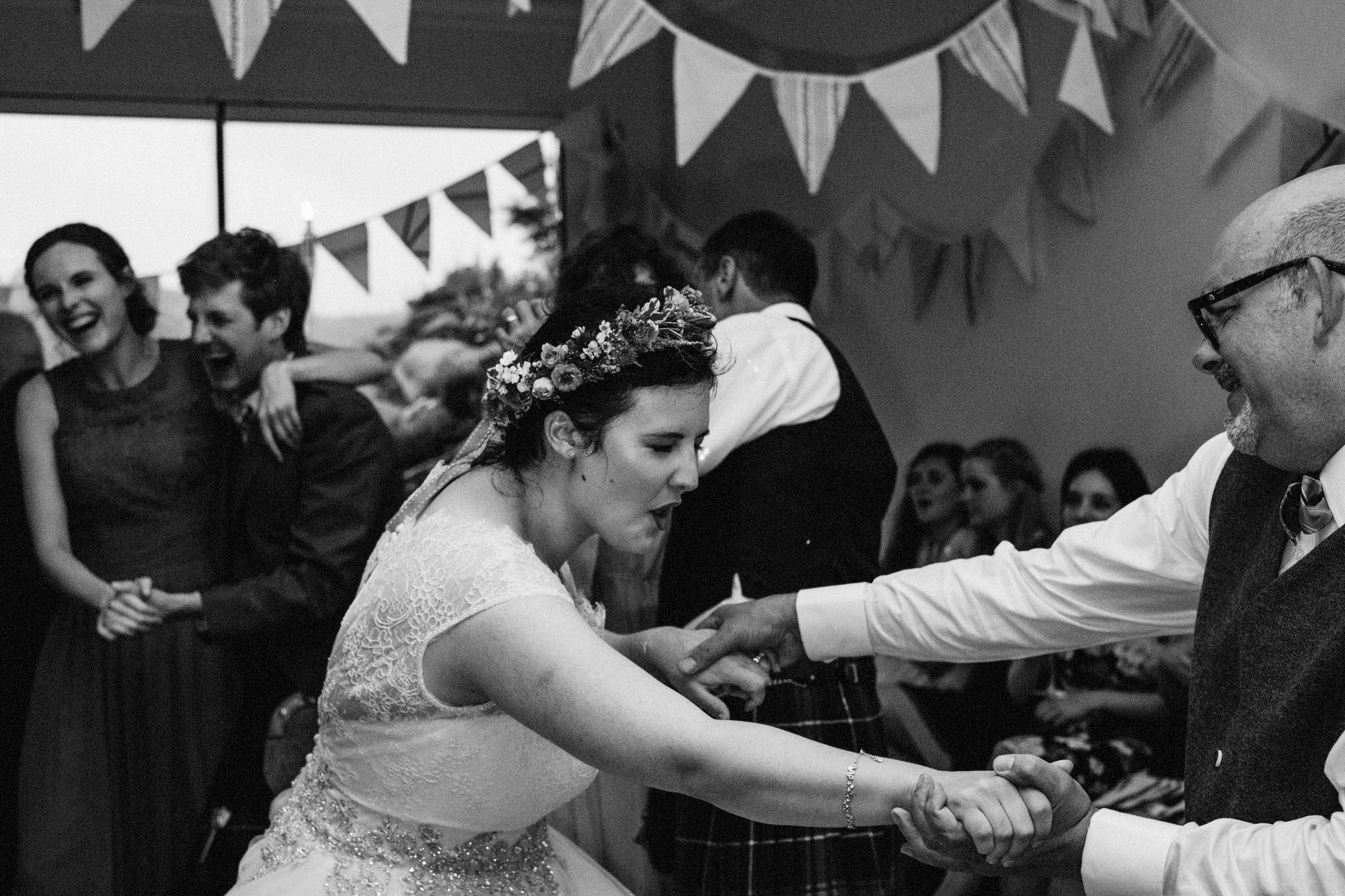  Bride and her father dance energetically