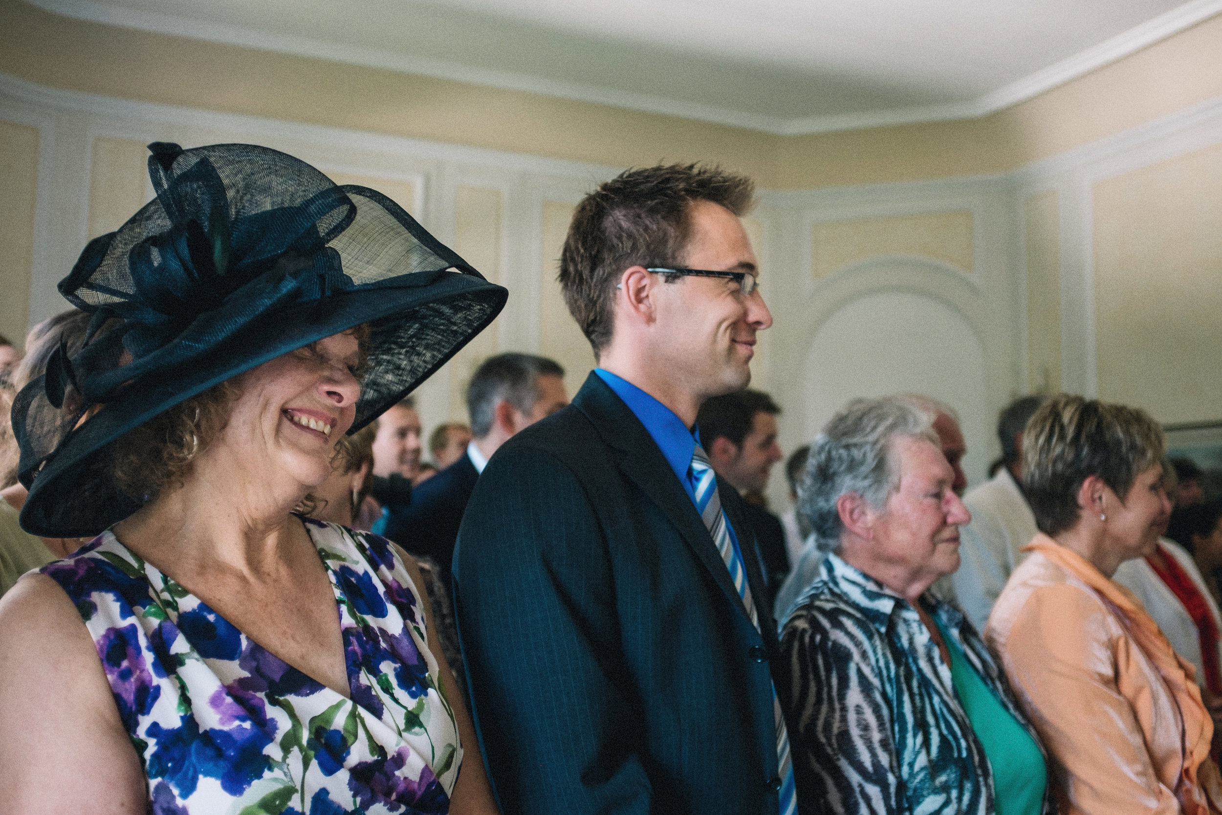 Proud family smiling following the exchange of wedding vows