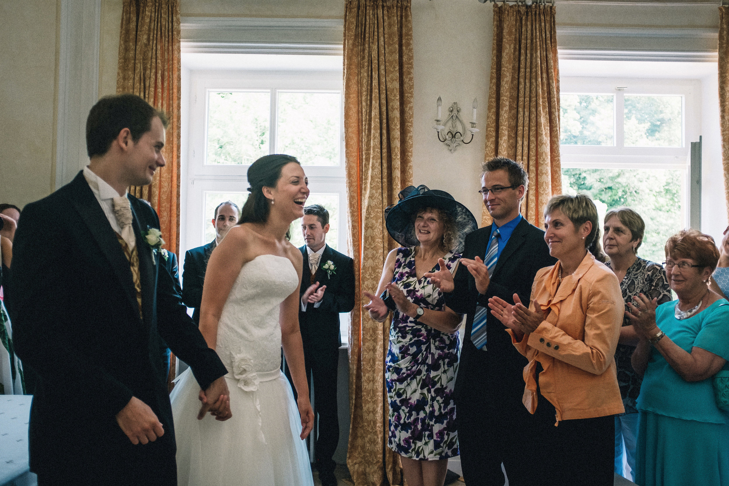 Facing the guests immediately after exchanging vows