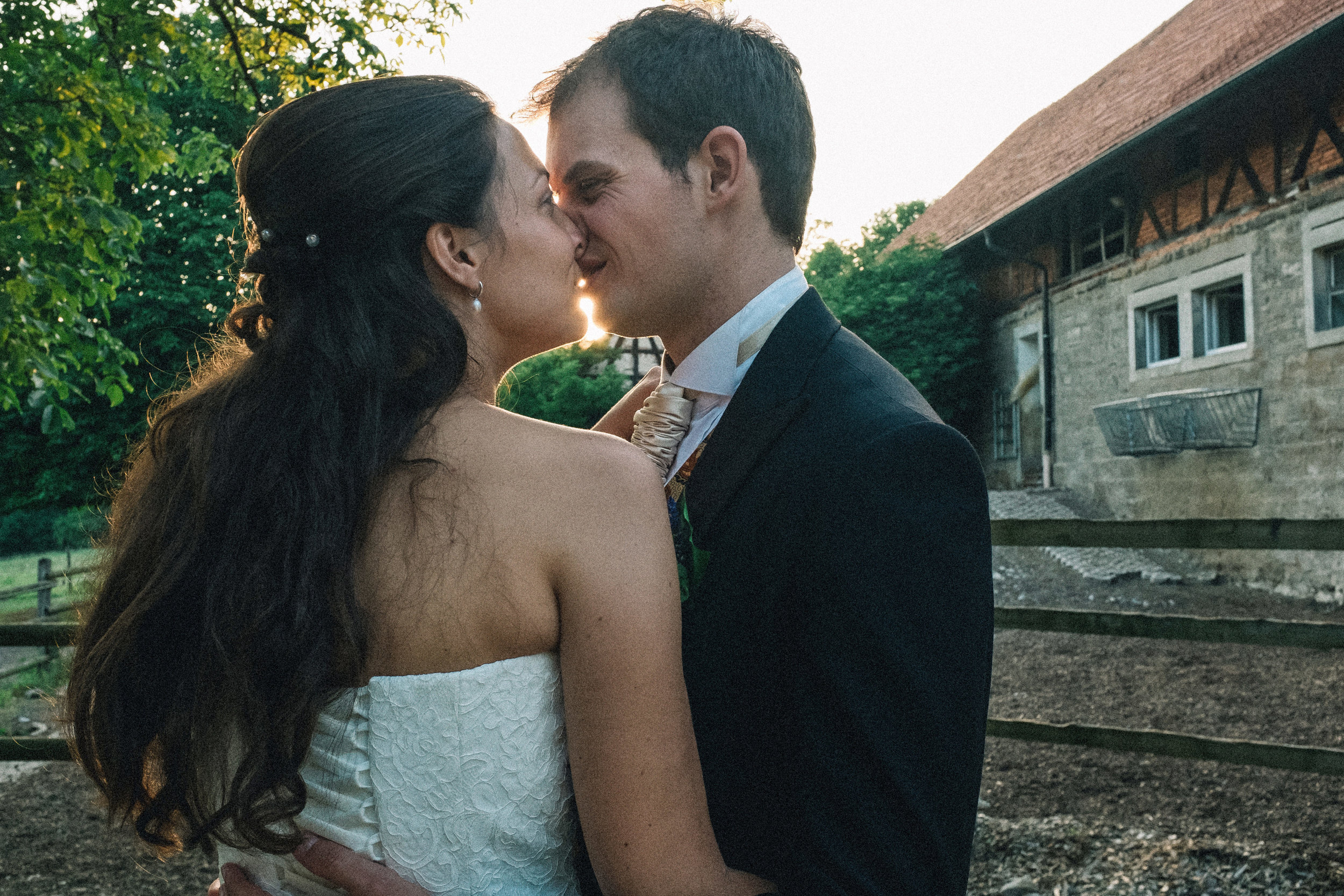 Bride and groom kiss