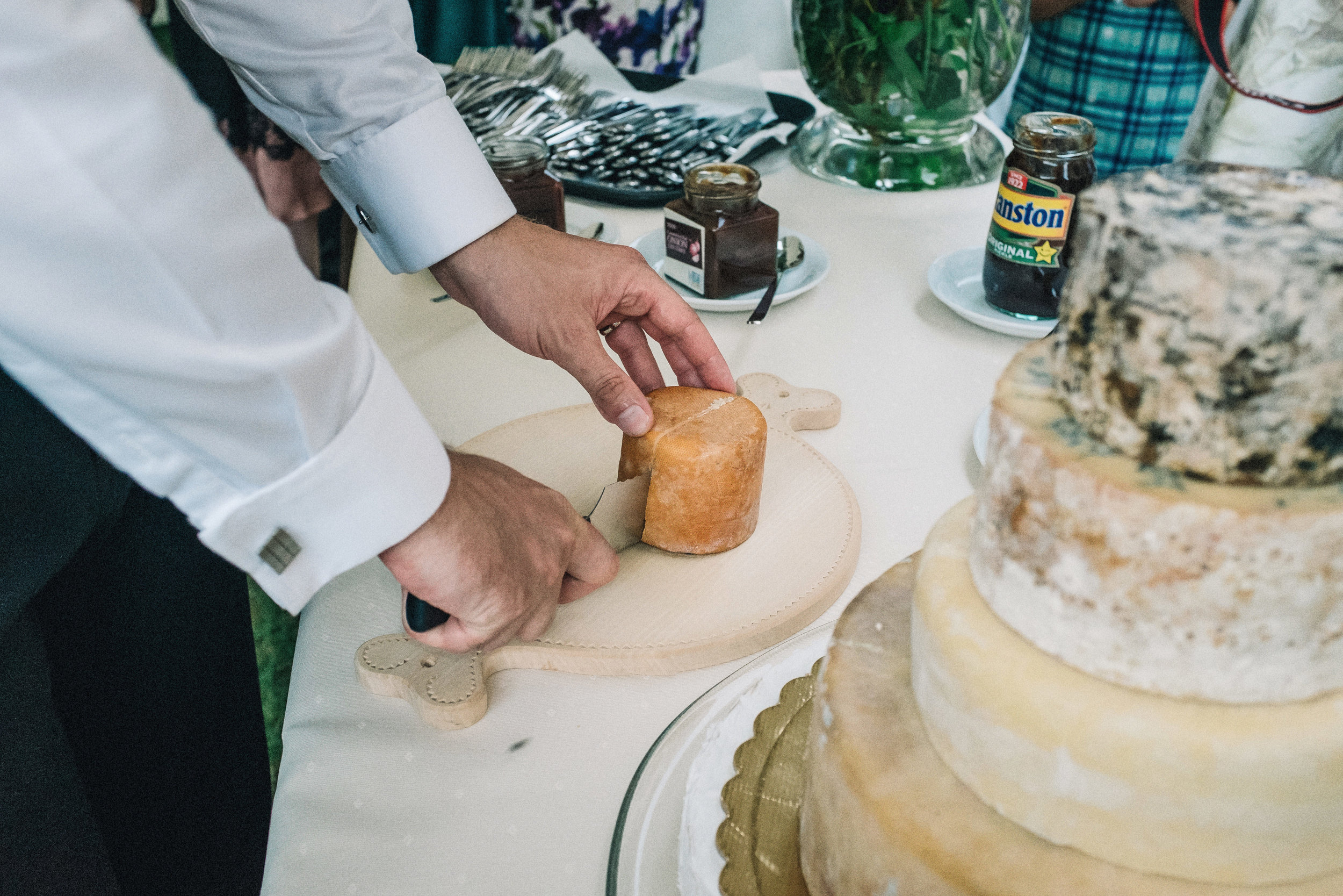 Cutting the wedding (cheese) cake