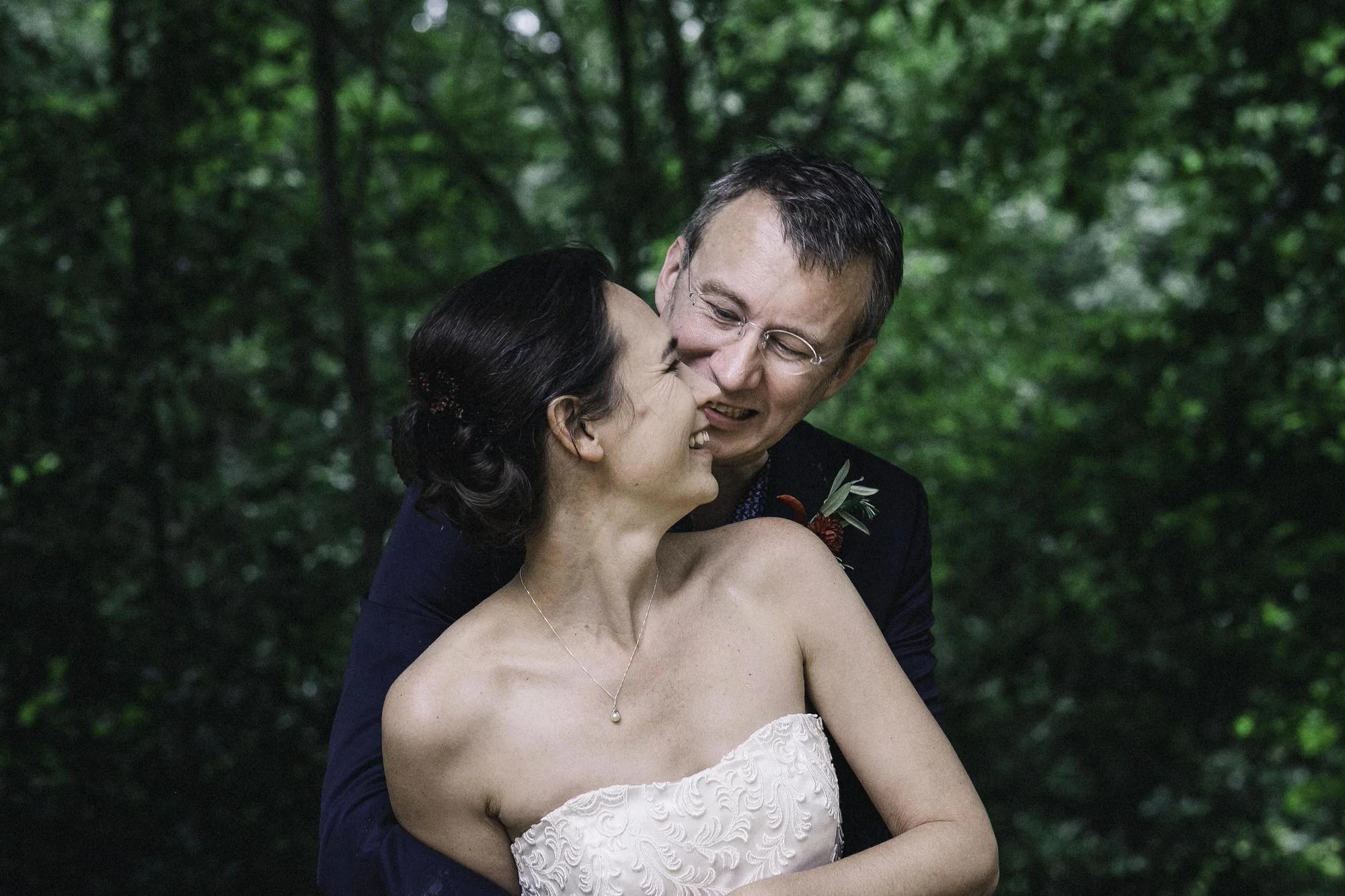 Smiling bride + groom
