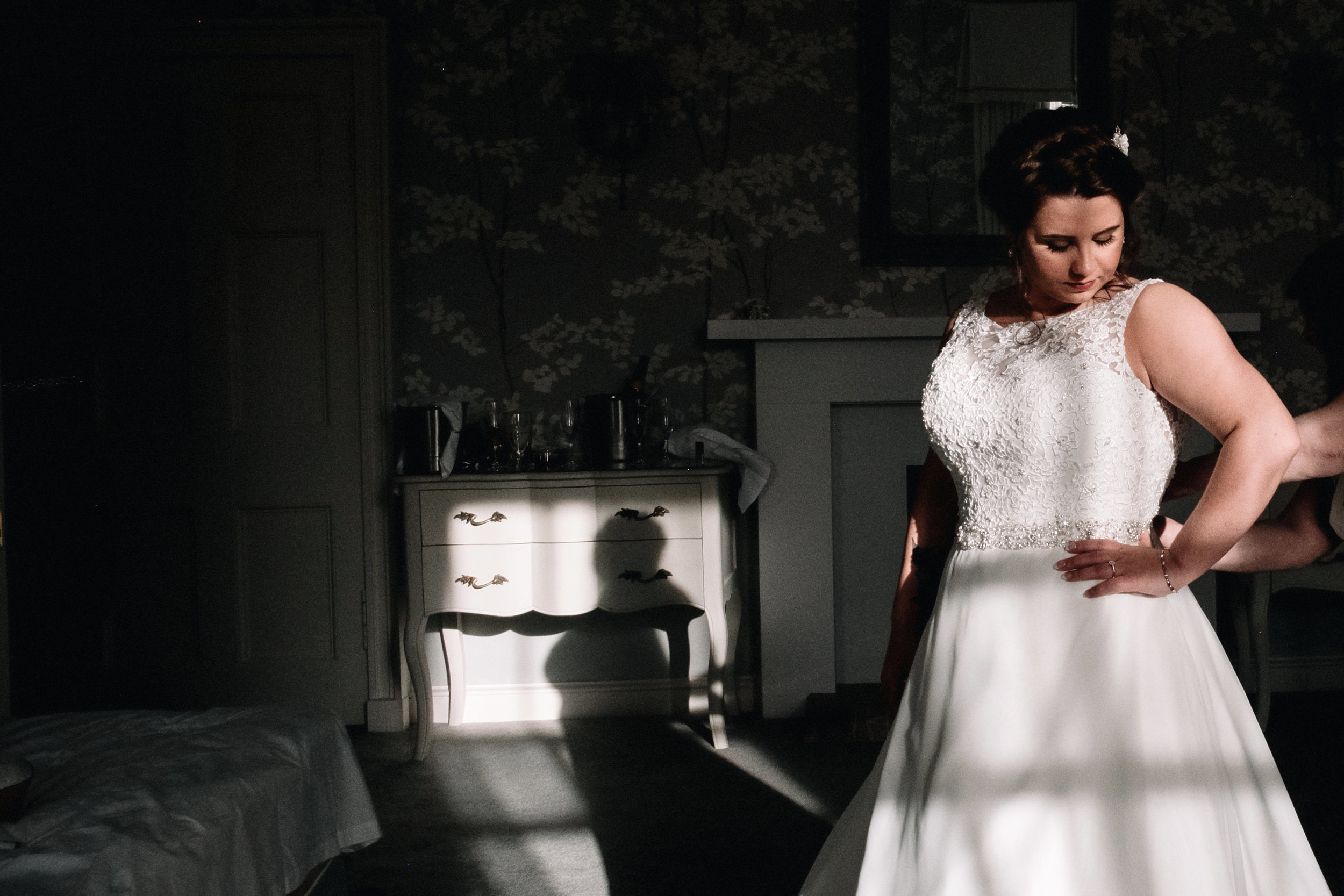 Bride getting dressed