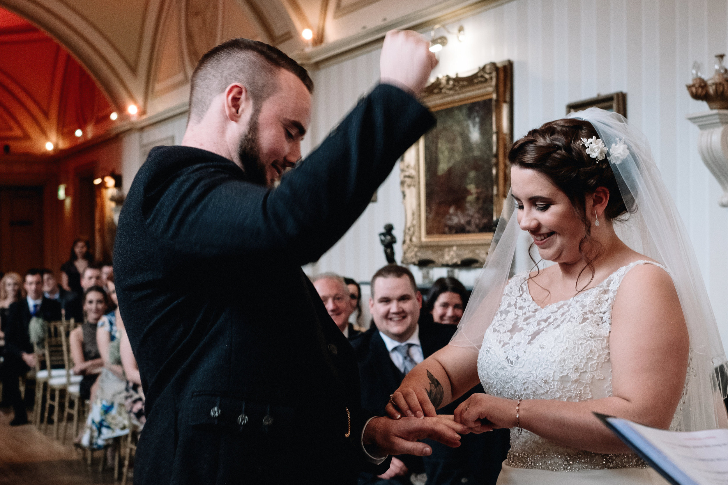 Groom fist punches the air 