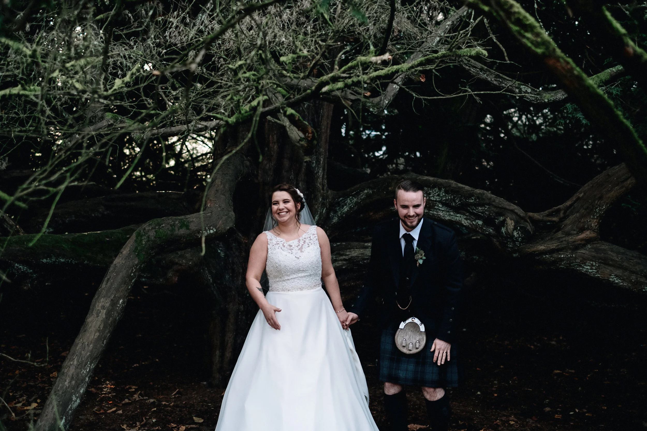 Laughing bride and groom
