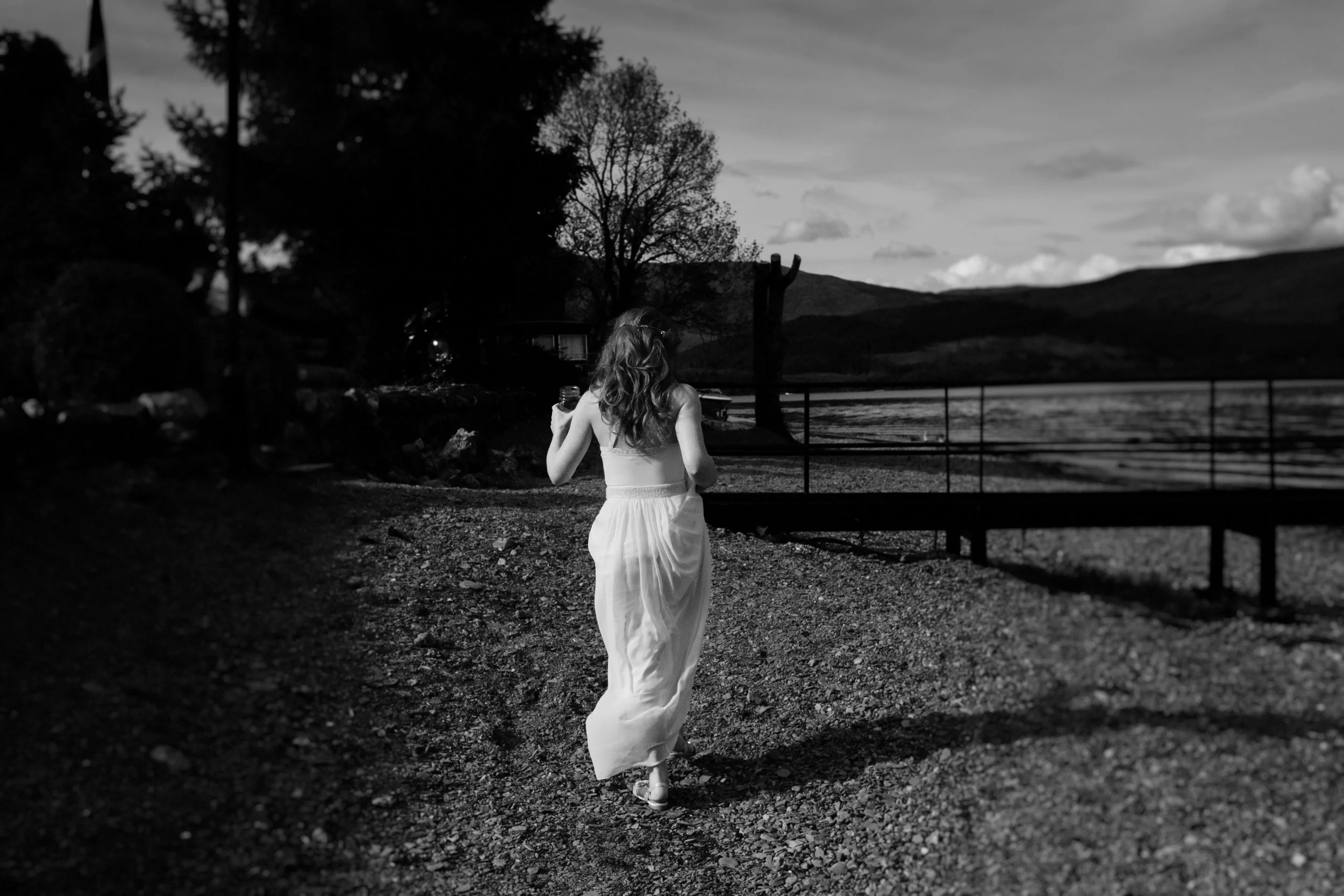 Bride walking on beach
