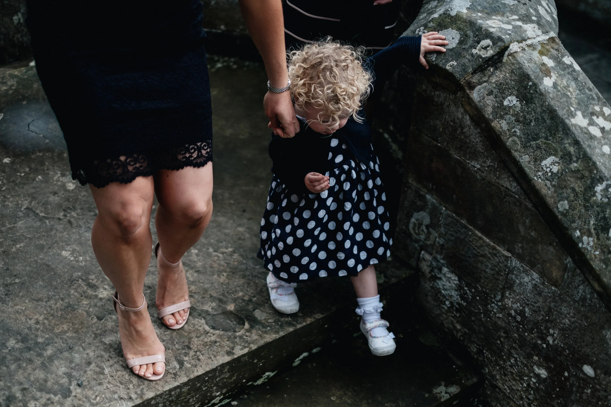 Child walks down stairs 