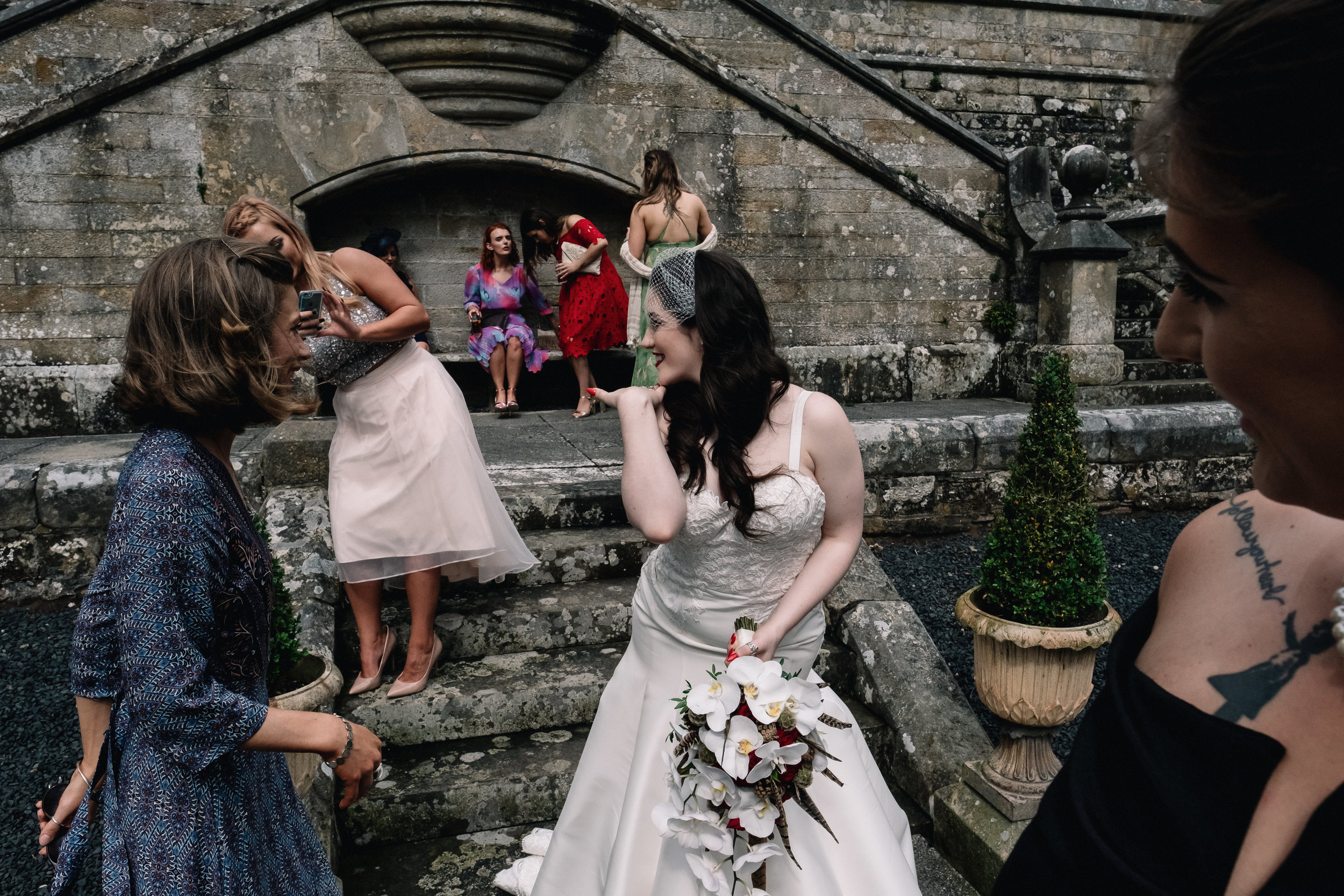 Bride blows kiss to friend