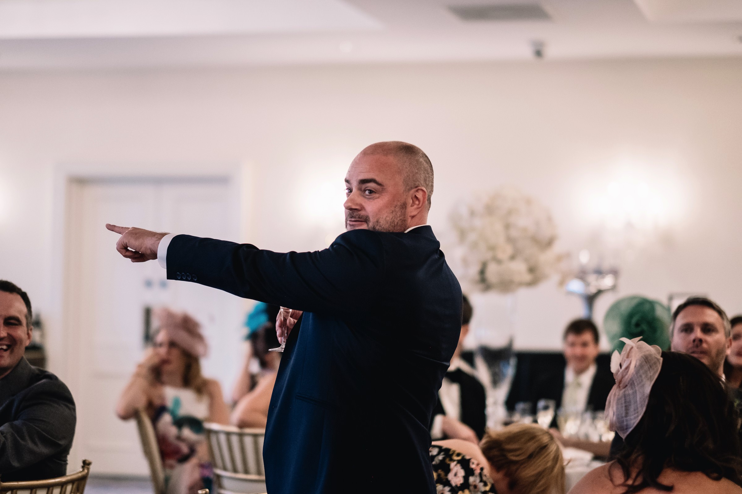 Pointing wedding guest