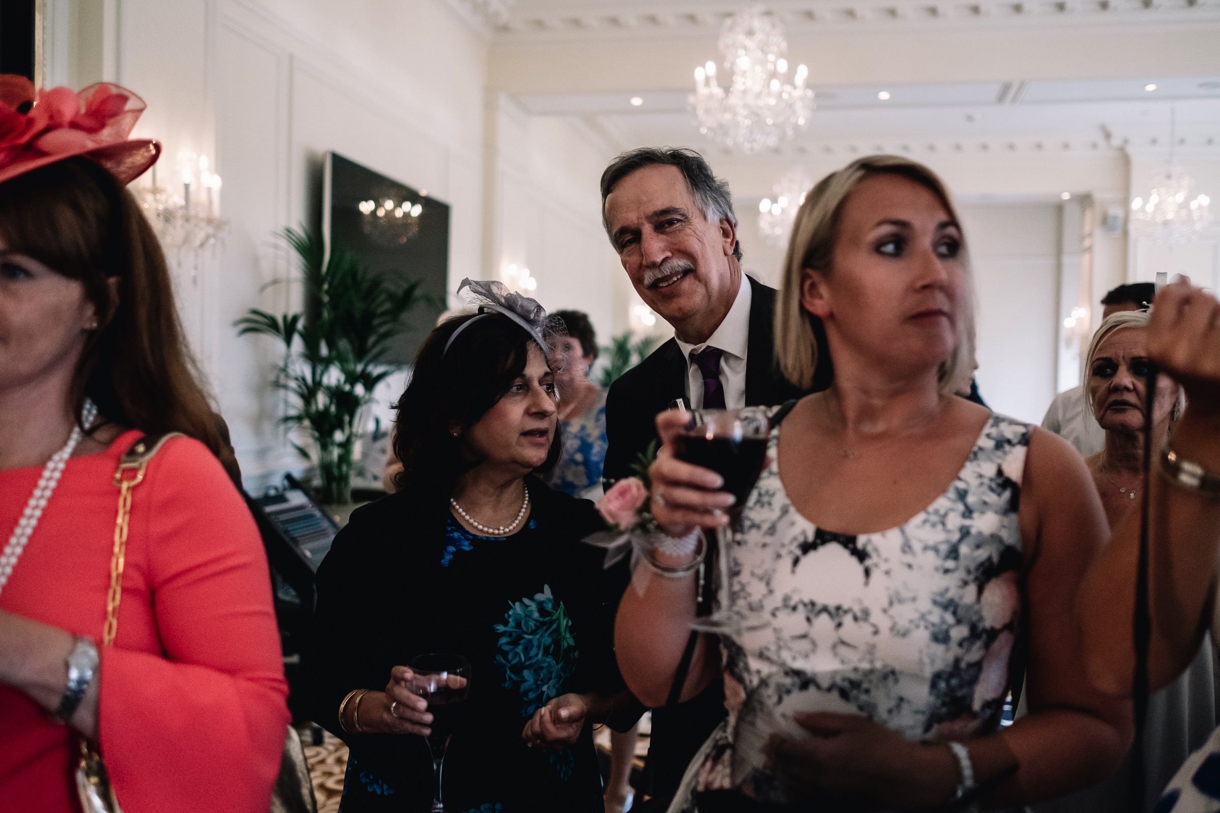 Guests watch cake cutting