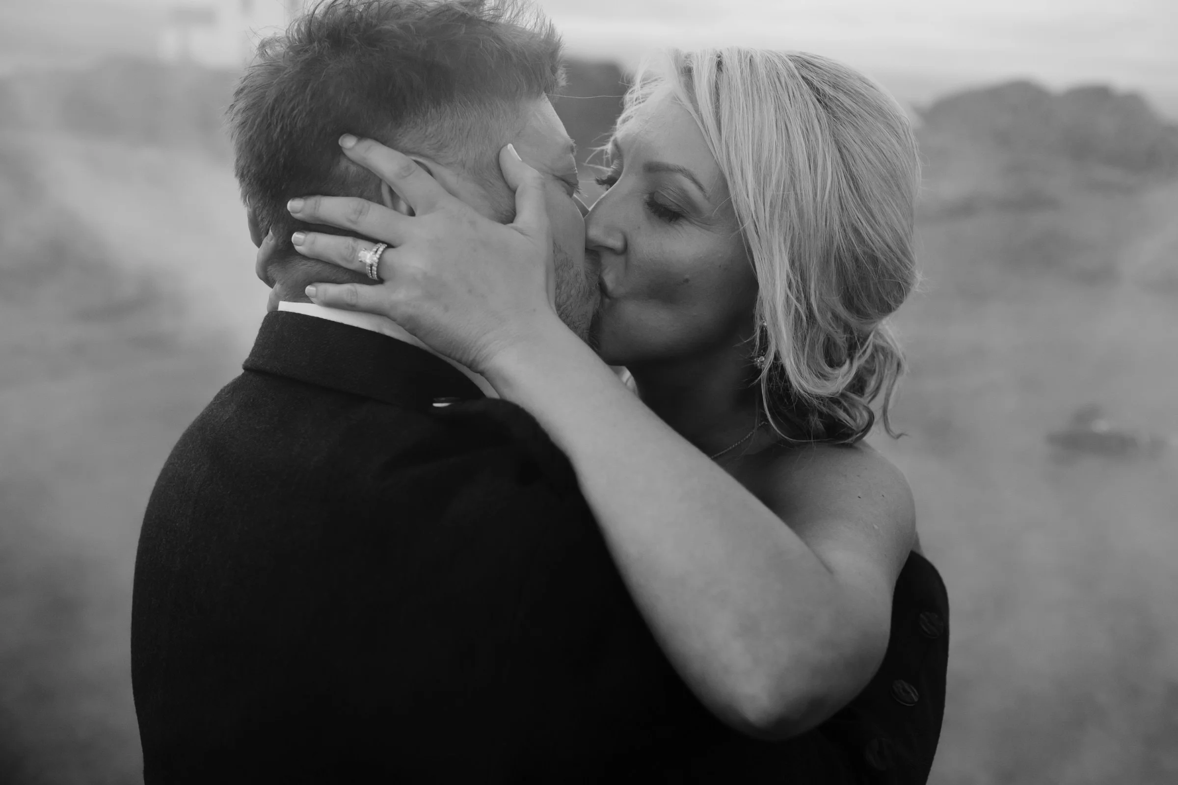 Bride and groom kiss