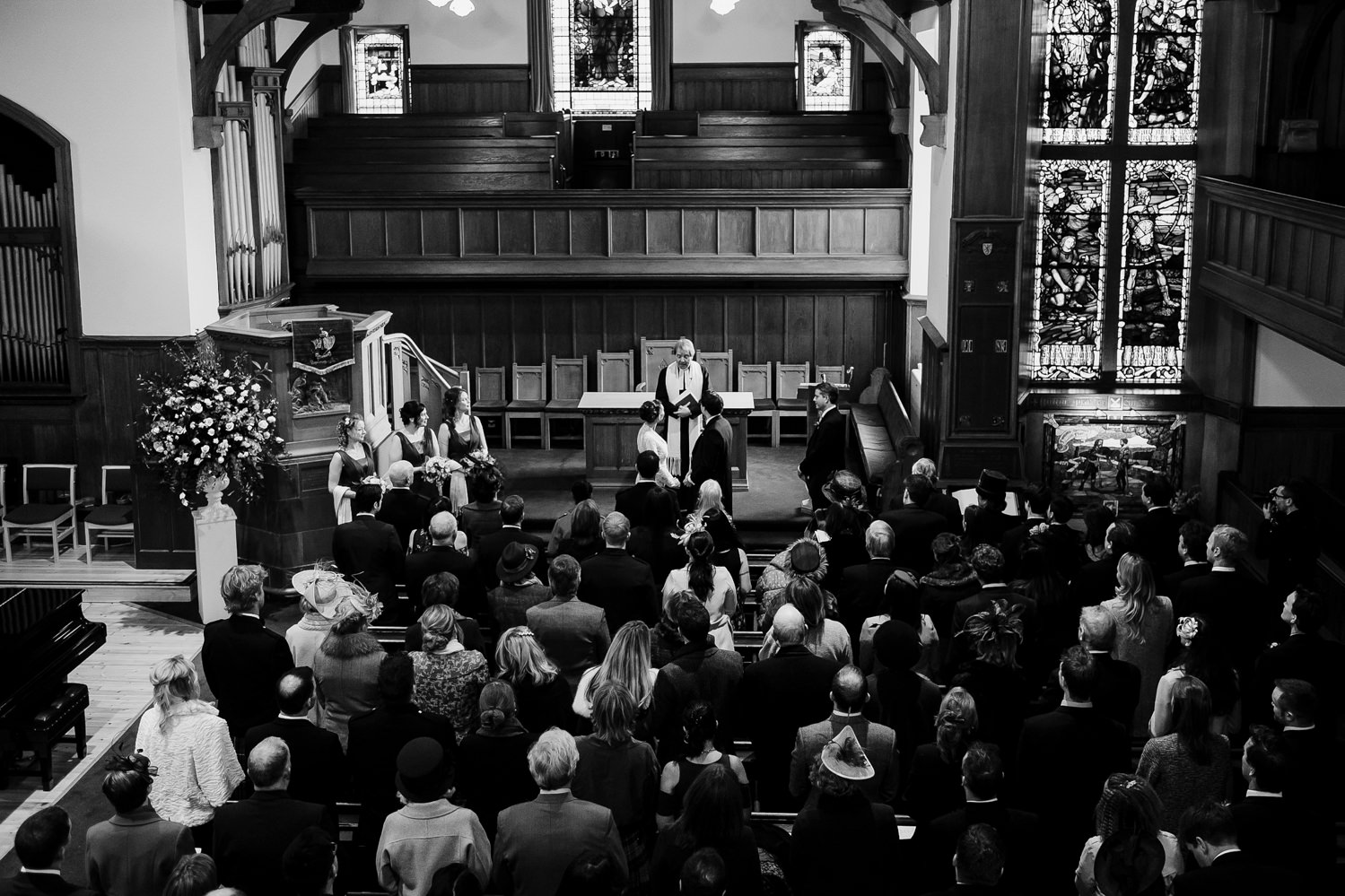 Aerial perspective of the congrgation and bridal party at Crammond Kirk