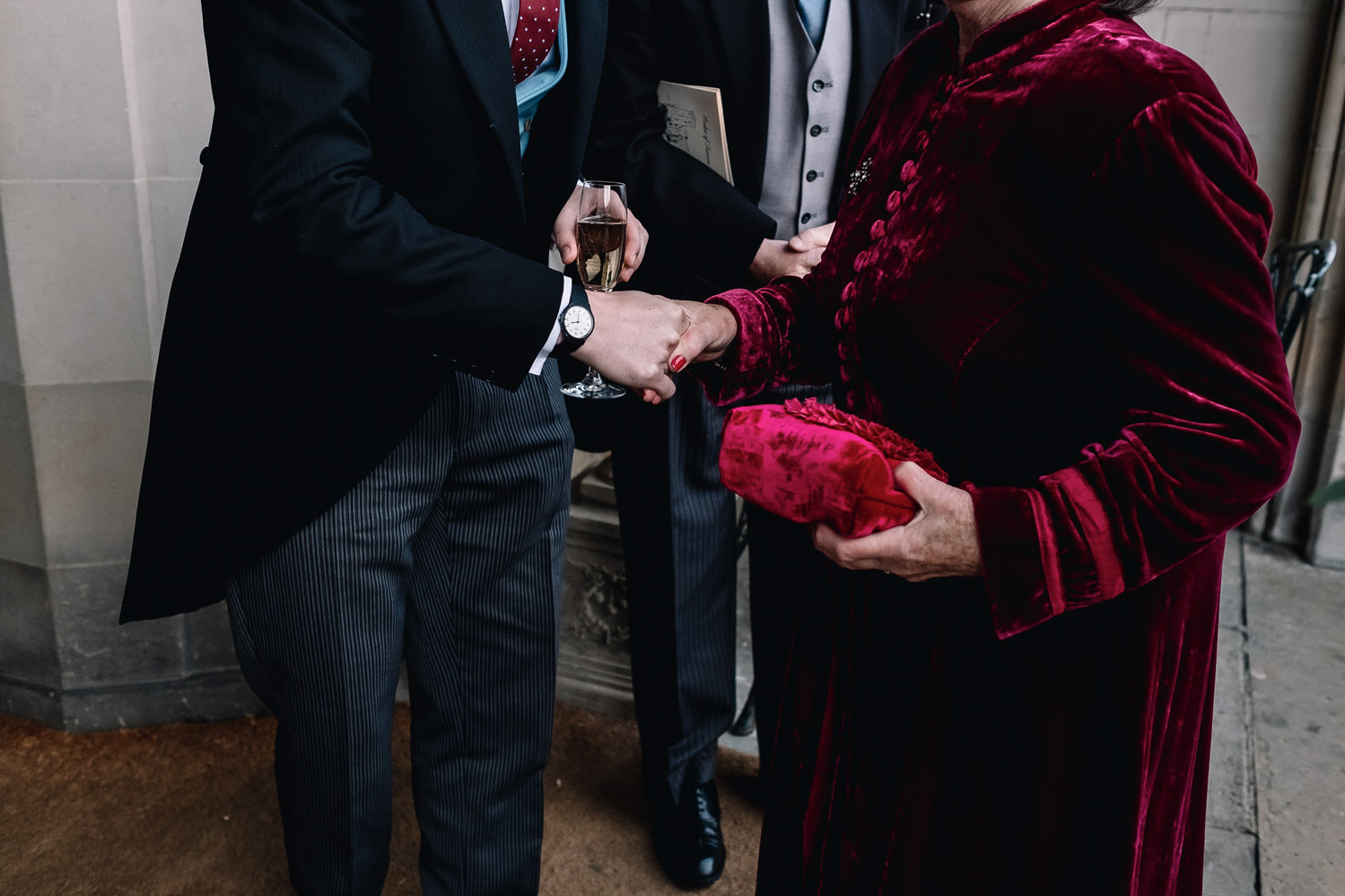 grooms shakes his mother's hand upon arrival at Dundas Castle
