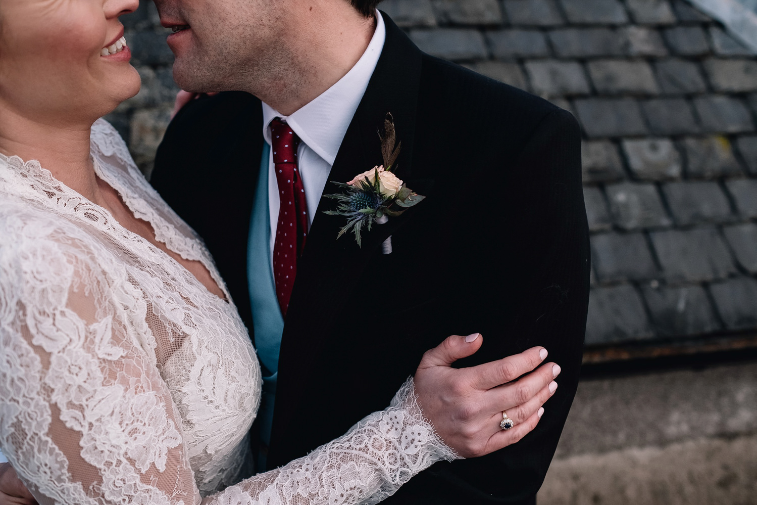 bride and groom hugging each other on their wedding day