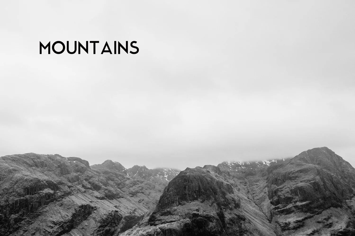 A photo of the tops of the Three Sisters of Glencoe where Robyn + Adam eloped to.