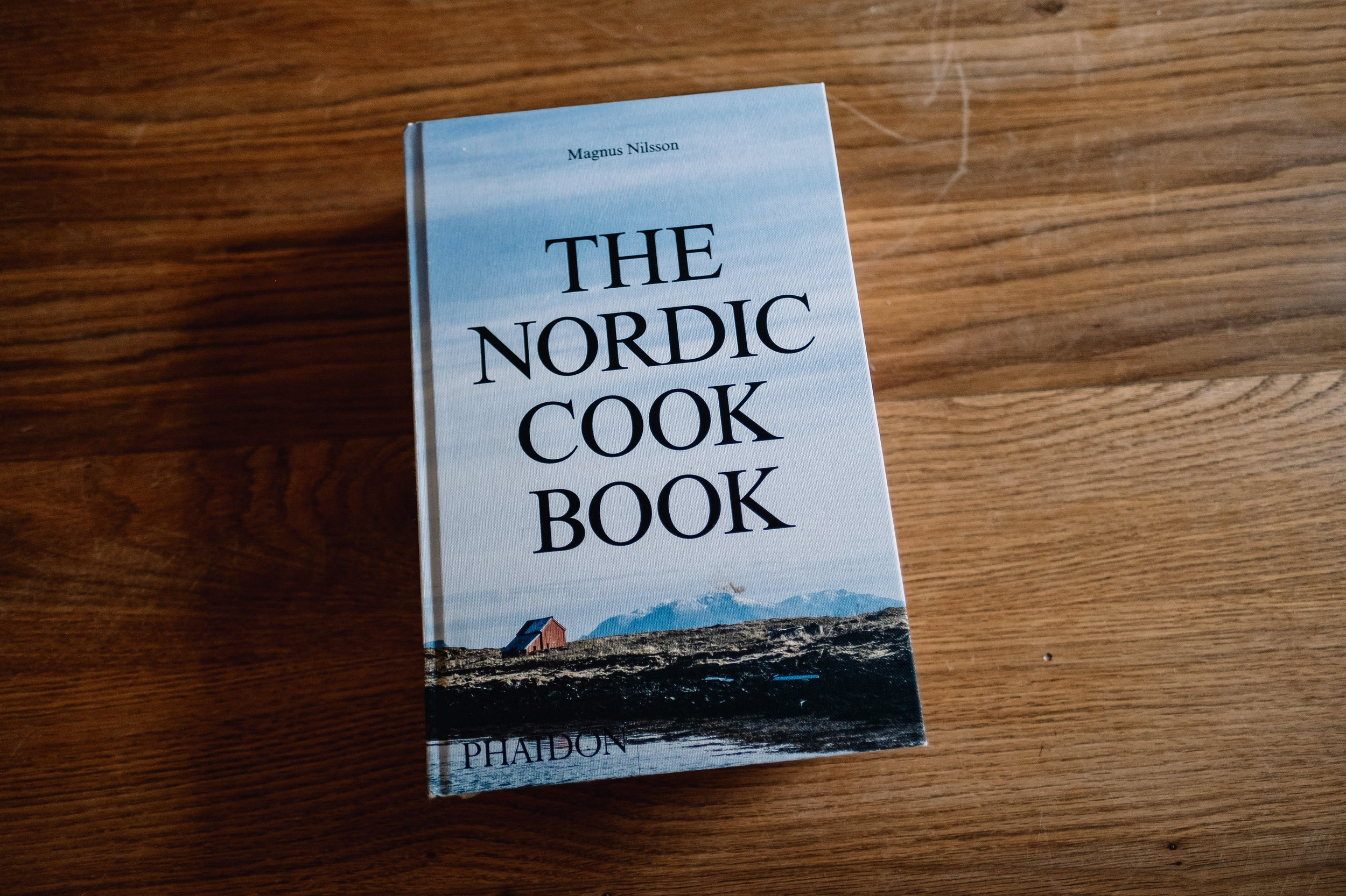 The Nordic Cook Book on the floor of the kitchen