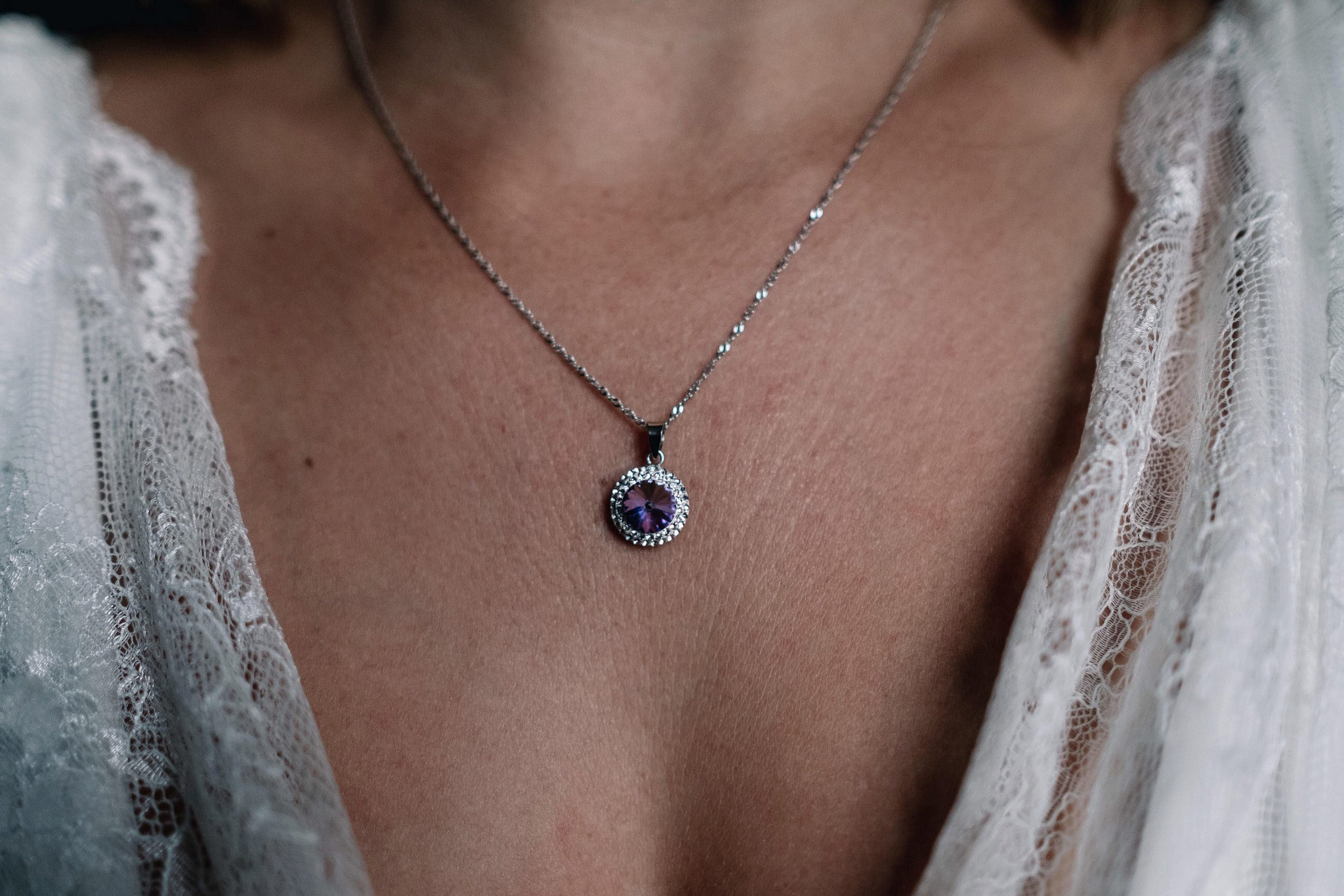  Close up photograph of the bride's necklace. 