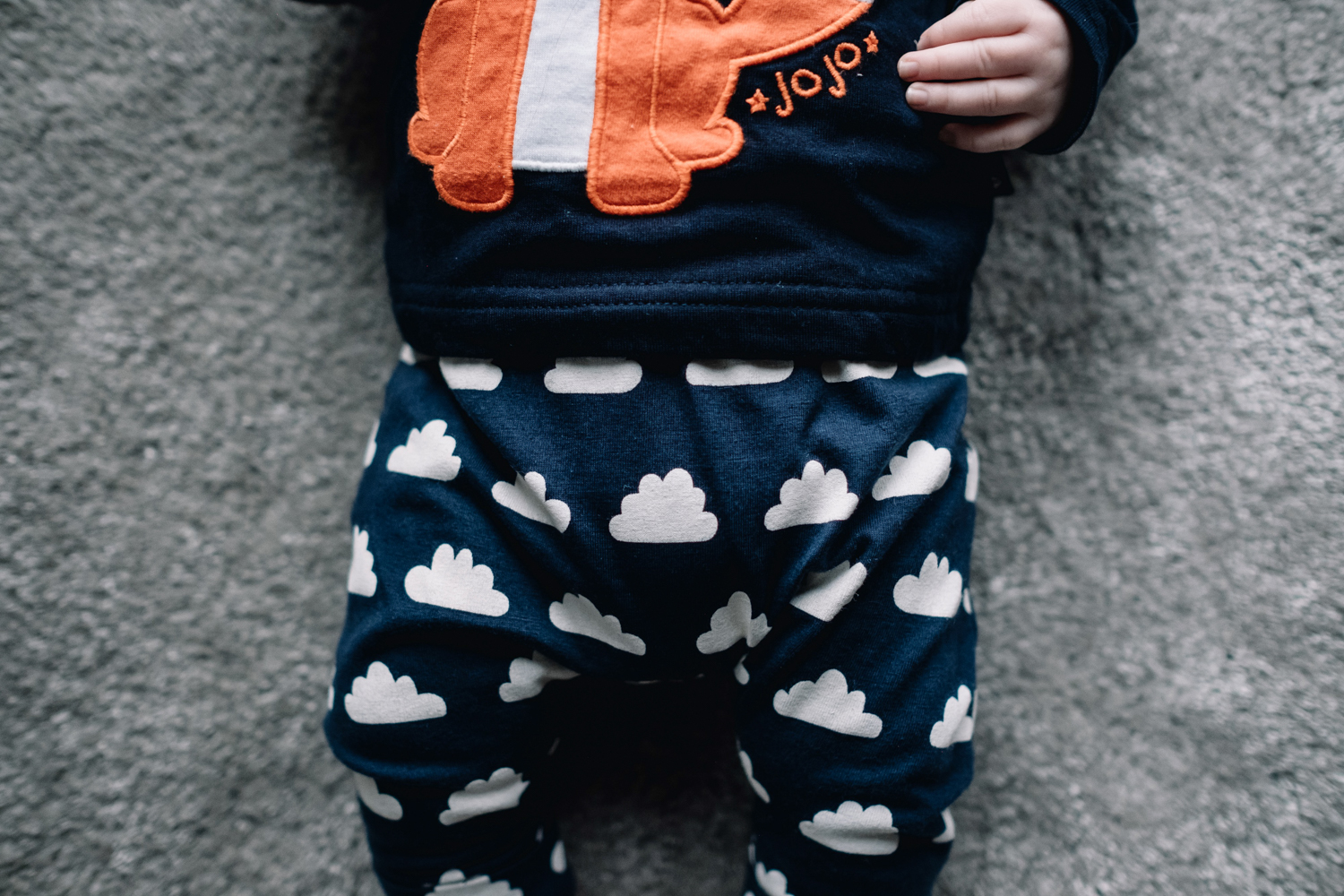  Close up of a baby's cloud leggings. 