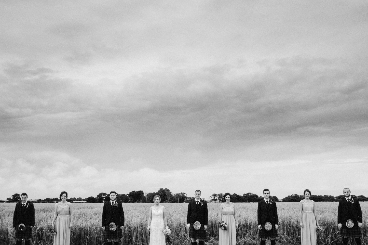An unconventional line up of the wedding party.