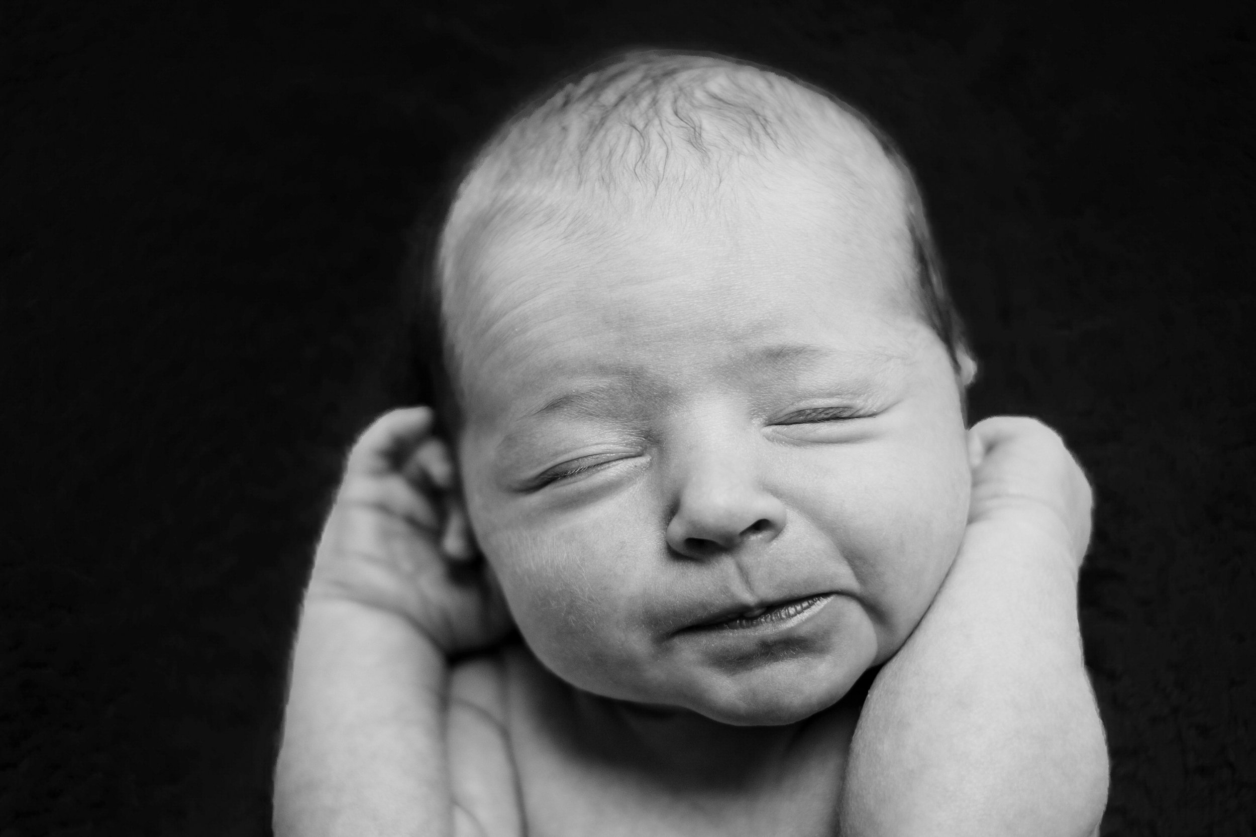 A baby is stretching.