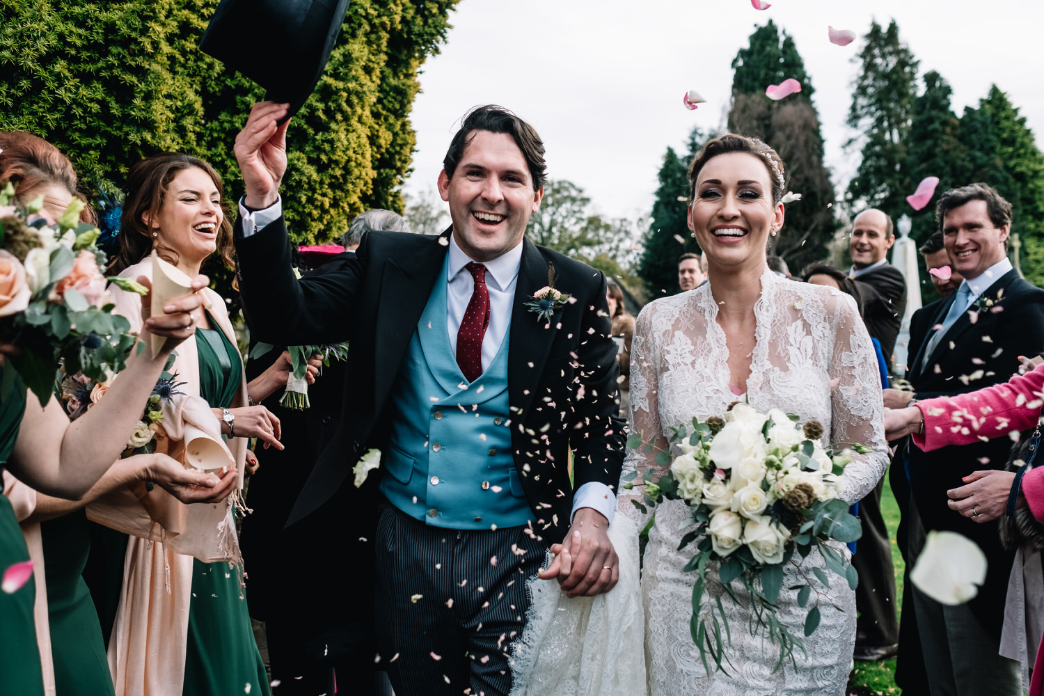  Bride and groom enjoy the confetti throw. 