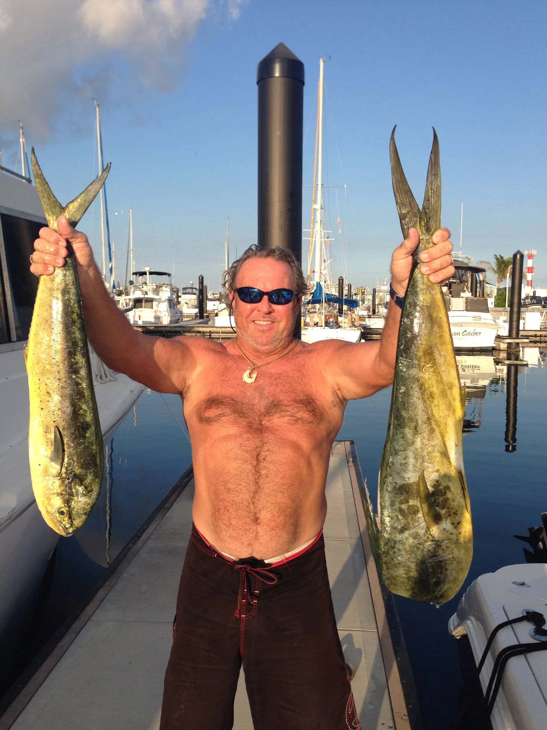 Captain Rick hold two of the Maji schoolies caught yesterday