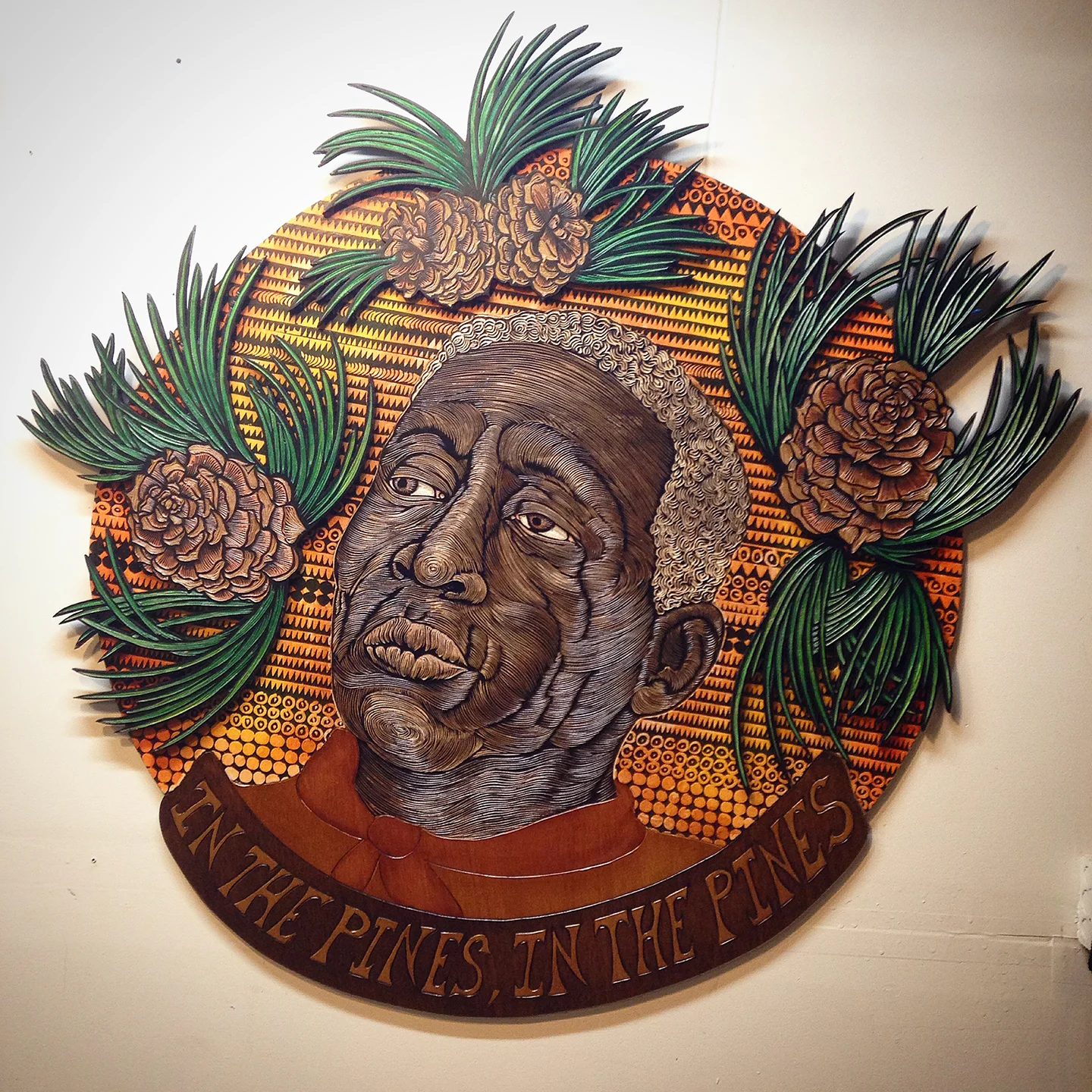 In the Pines, (Leadbelly) 2015 woodcarving, wood stain and acrylic 44x44"