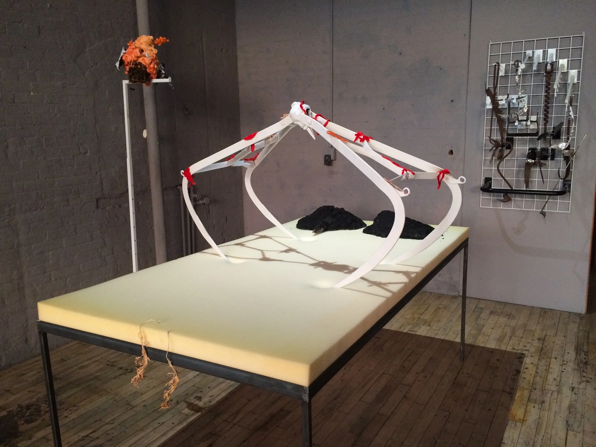   Suite   foam, steel, velvet, wood, tar, mop heads  5' x 7' x 3'  2015 