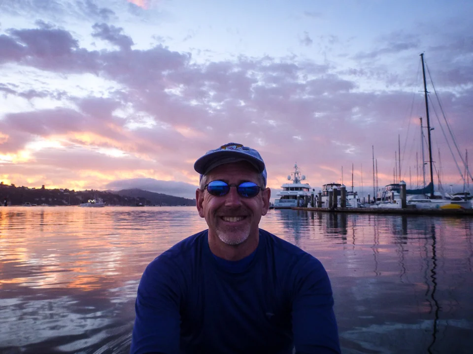 Stefan Benton humoring me as I take another photo on the bay. Sunday, Aug. 17, 6:30 a.m.