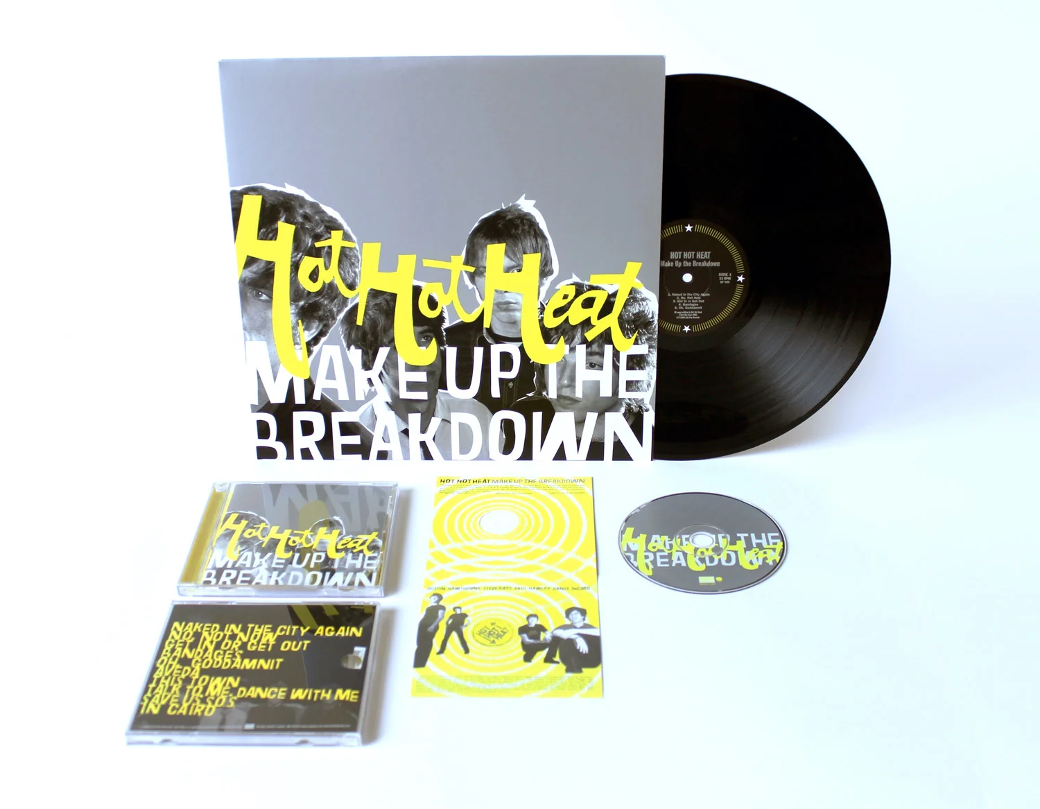 Hot Hot Heat Make Up the BreakdownMetallic silver, fluorescent yellow and black inks give the package impact. Additionally, putting the band’s photo on the cover, but covering it up with lettering simultaneously references the band’s image-conscious…