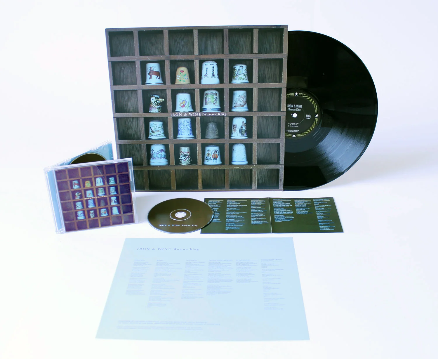 Iron &amp; Wine Woman King EPThe folk songs on this record are controlled, delicate and precise. The cover image of thimbles on a small wooden shelf felt like the perfect fit.&nbsp;