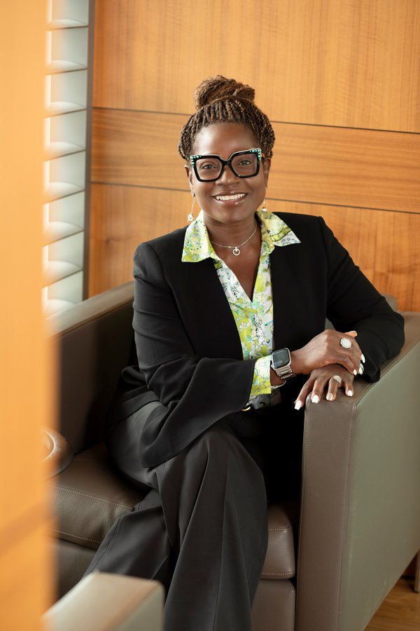 Stylish business woman sitting down portrait