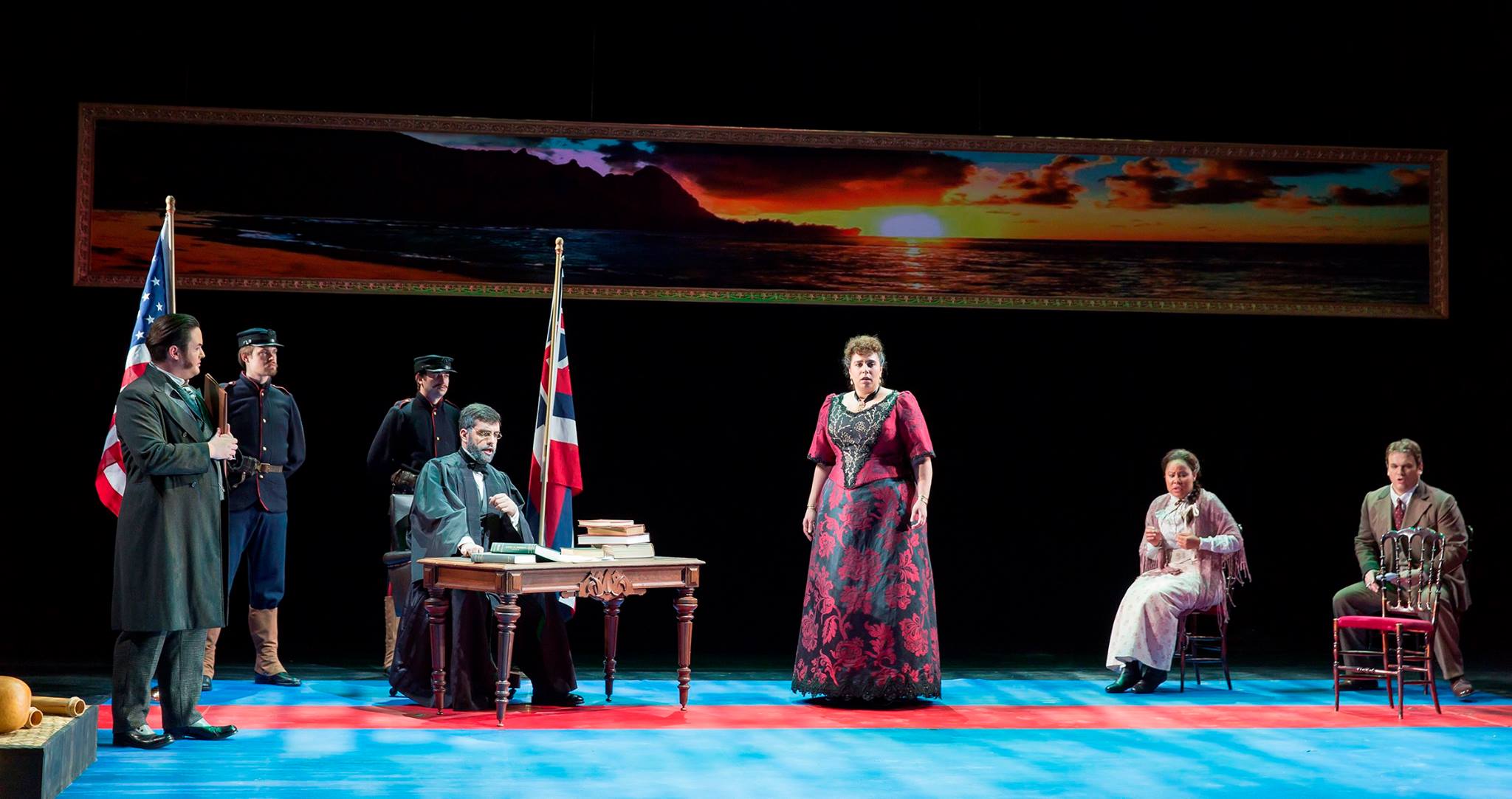 Ariana Wehr Kahua in the World Premiere of Better Gods at Washington National Opera with Rexford Tester as Lorrin Thurston, Timothy J. Bruno as Judge Judd, Daryl Freedman as Queen Liliuokalani, and Hunter Enoch as James Miller. Photo Credit: Scott S…