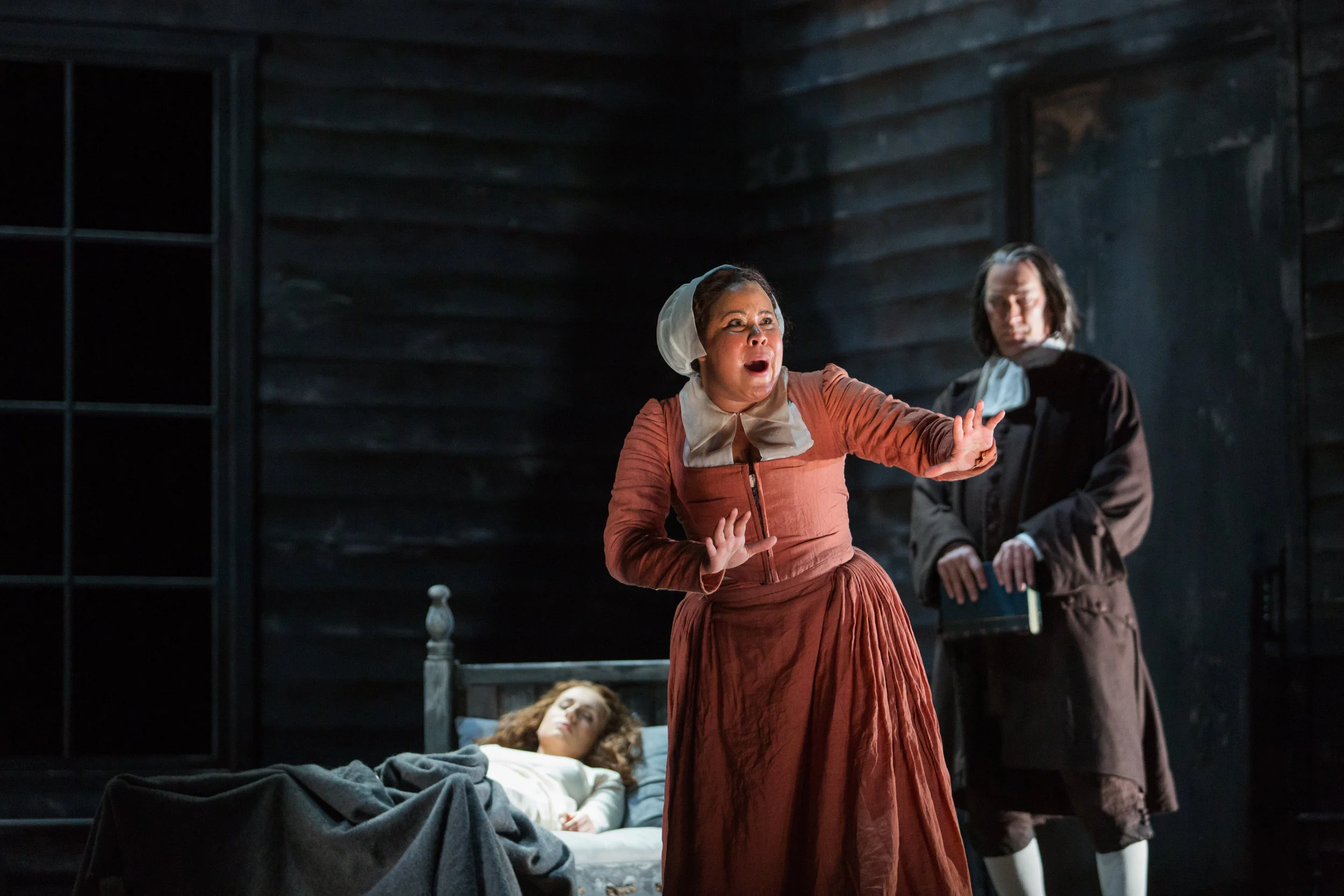 Ariana Wehr as Abigail Williams in The Glimmerglass Festival's 2016 production of The Crucible with David Pittsinger as Rev. Hale and Mary Beth Nelson as Betty Parris. Photo Credit: Karli Cadel