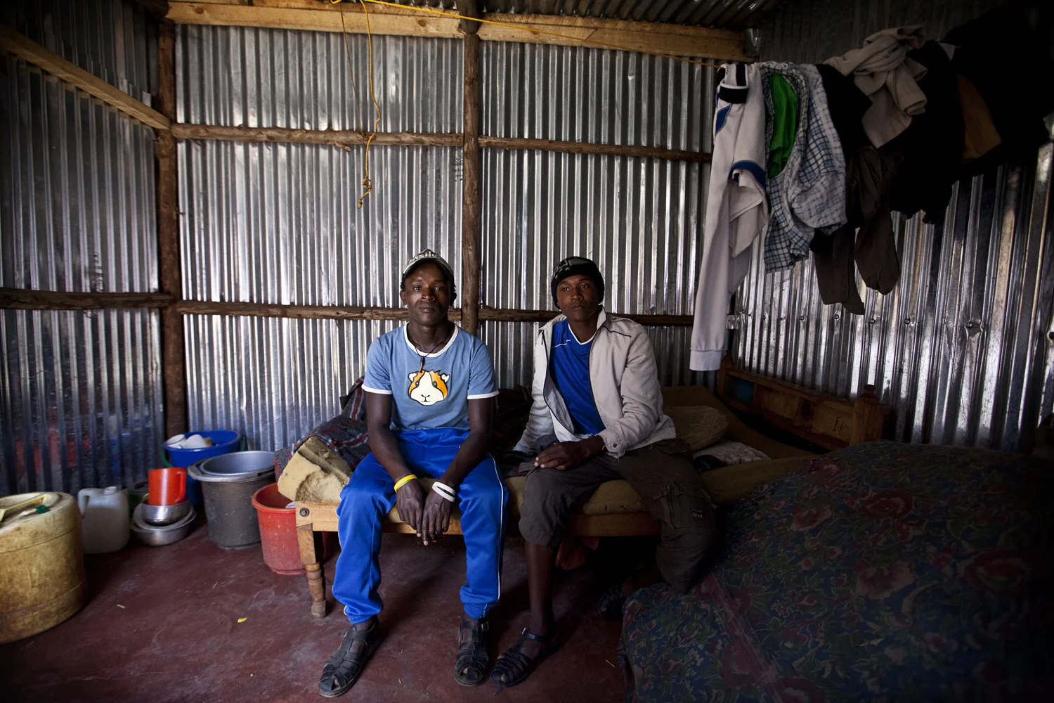 John and Antony. John and Antony met and became friends while both living on the streets of Kawangware. They now share a one room home, and split the monthly rent of 1,500 Kenyan shillings (roughly $18 CAD). (2012) 